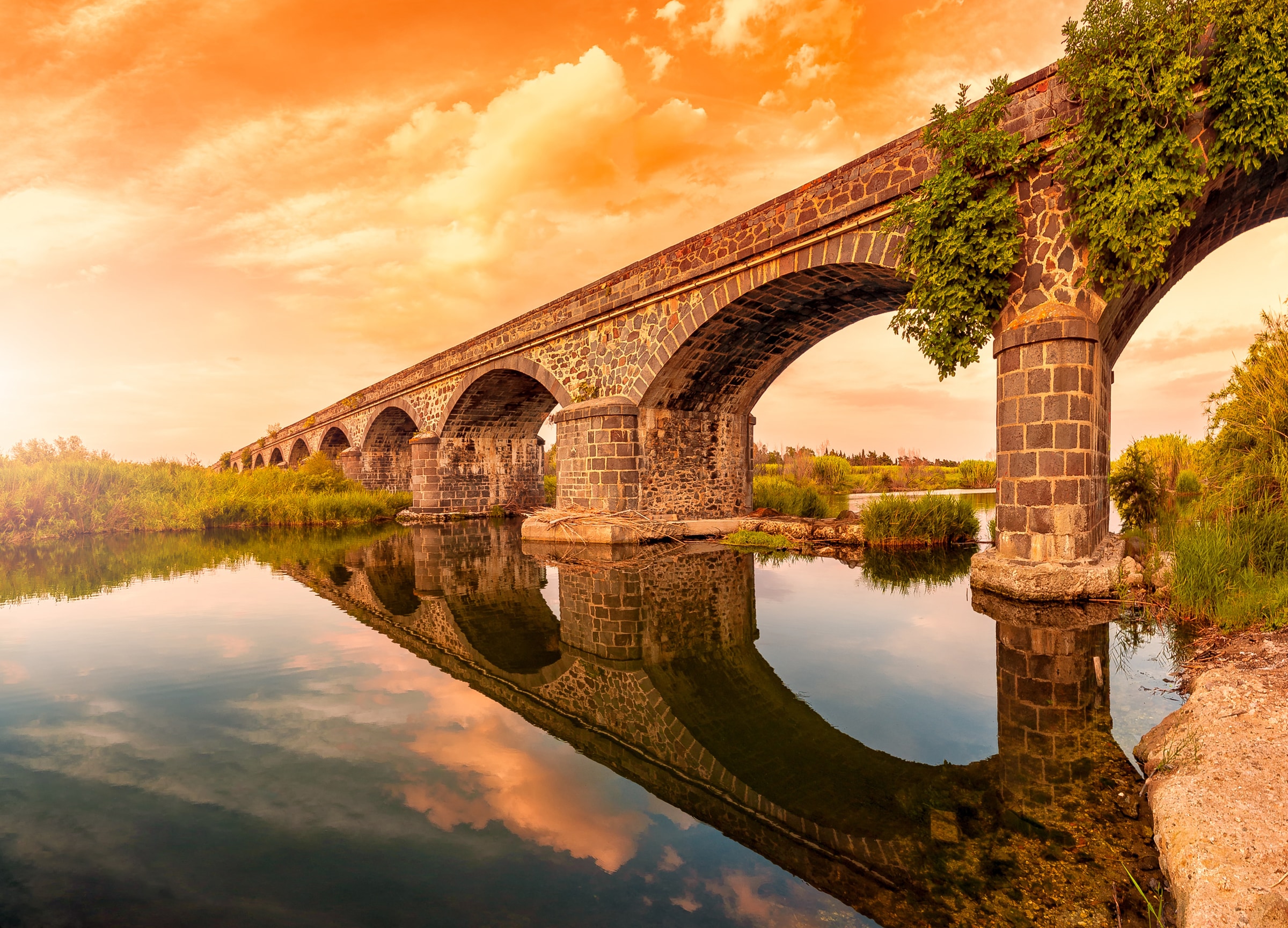 Image of Papermoon Fototapete "Ancient River Arches Cedrino" glatt
