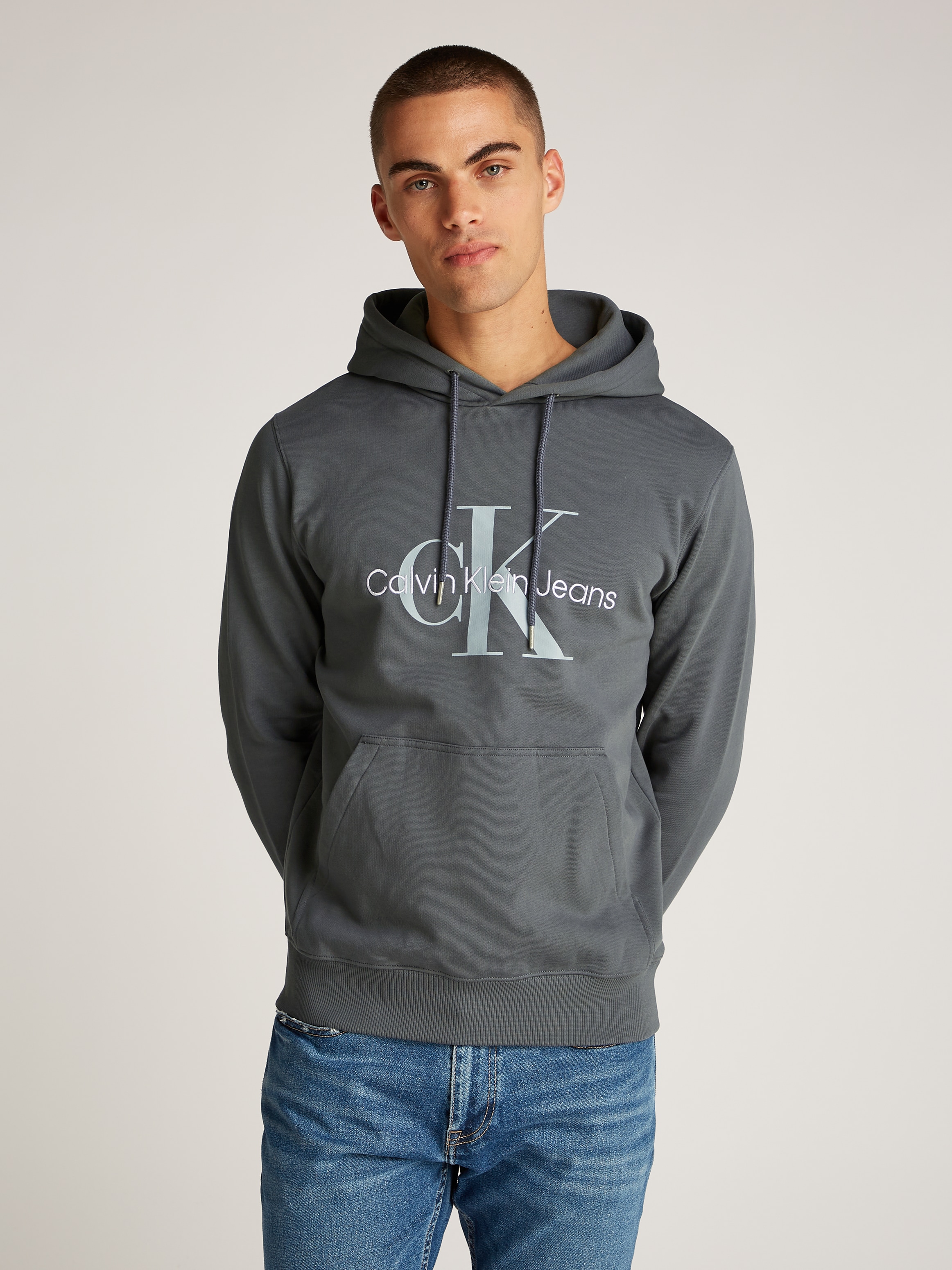 Calvin Klein Jeans Kapuzensweatshirt »SEASONAL MONOLOGO REGULAR HOODIE«, mit Logodruck und Stickerei