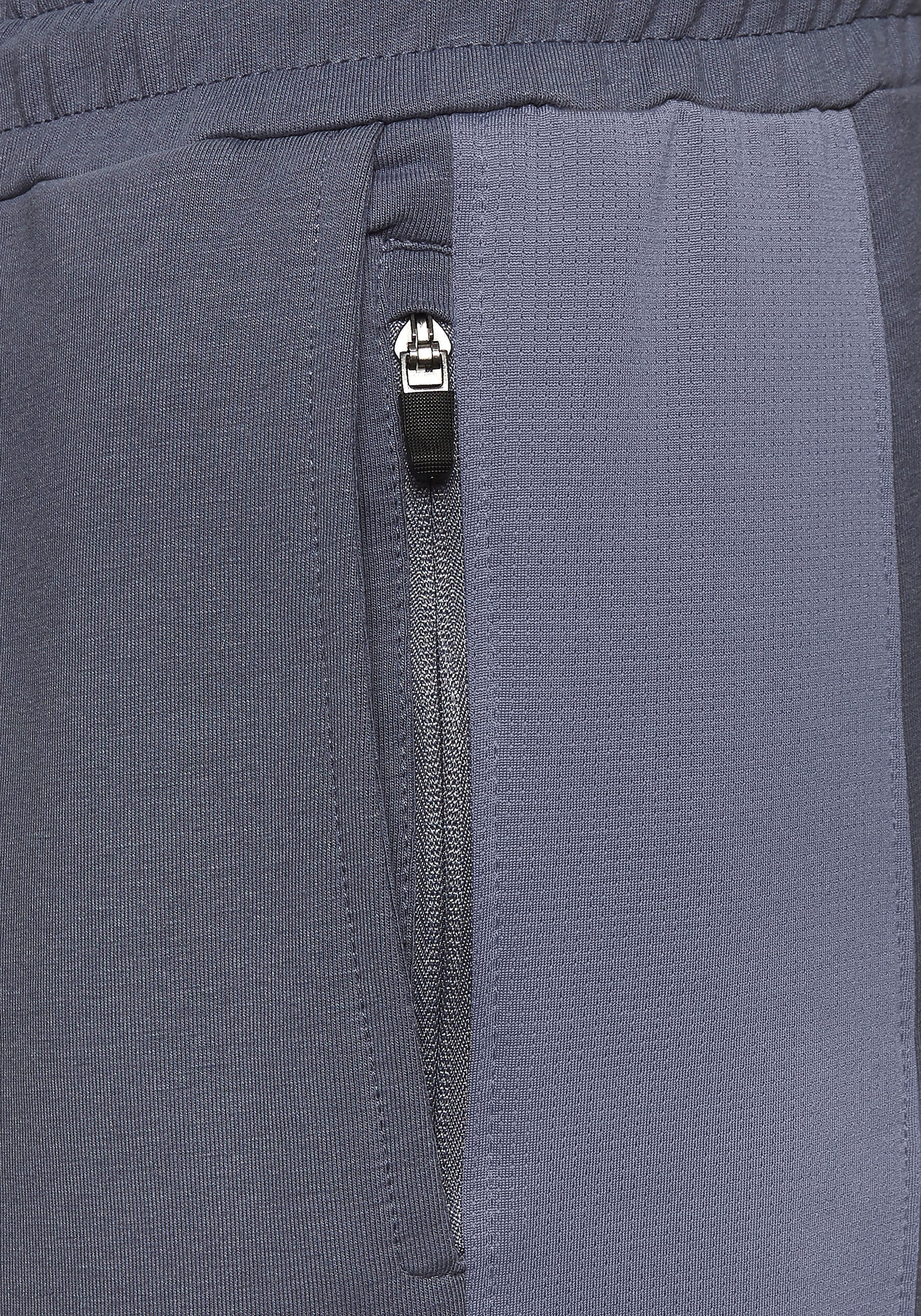 le jogger® Sweatpants, mit farblichen Einsatz und Reissverschlusstaschen