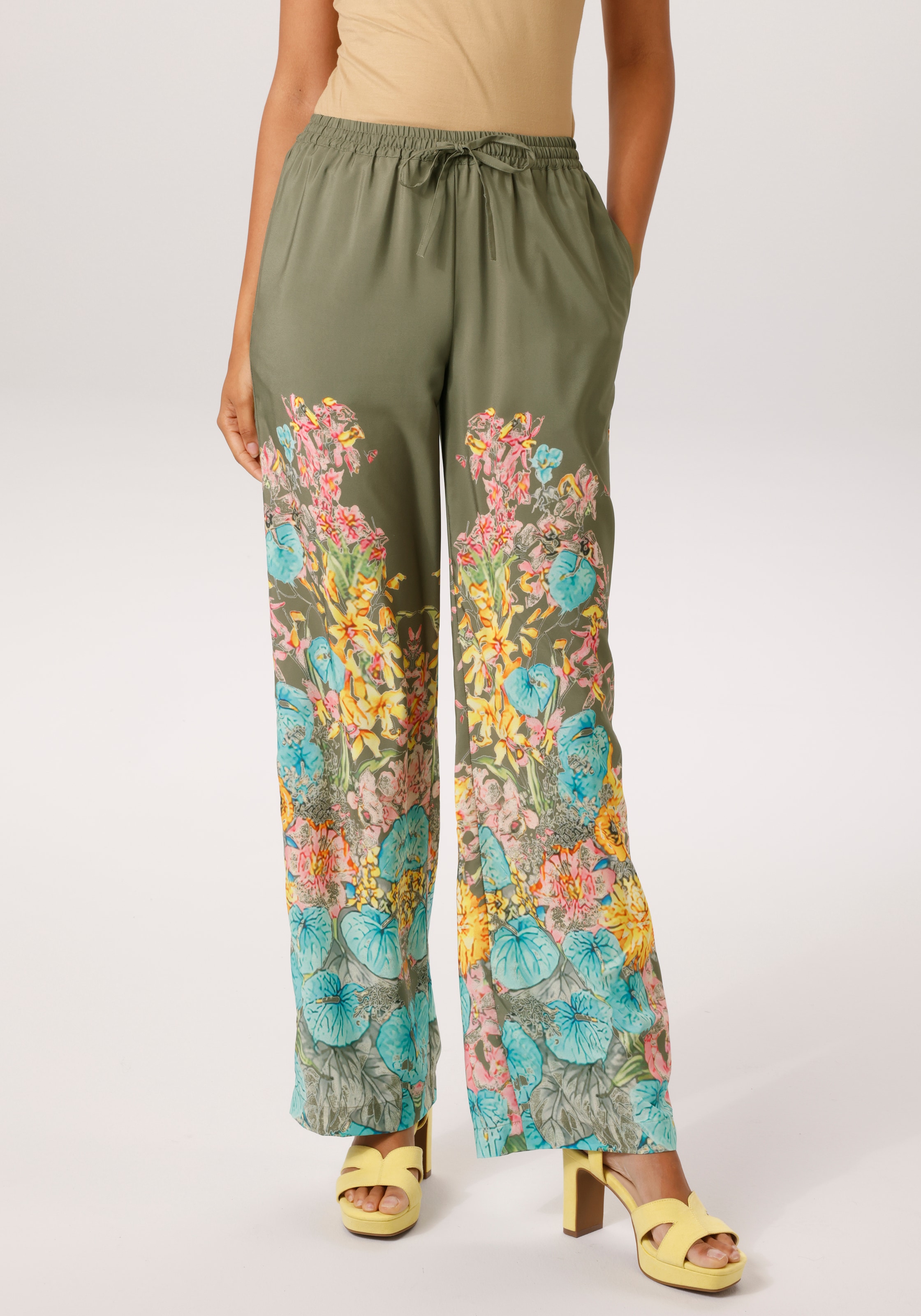 Image of Aniston CASUAL Schlupfhose mit farbenfrohen Blumendruck