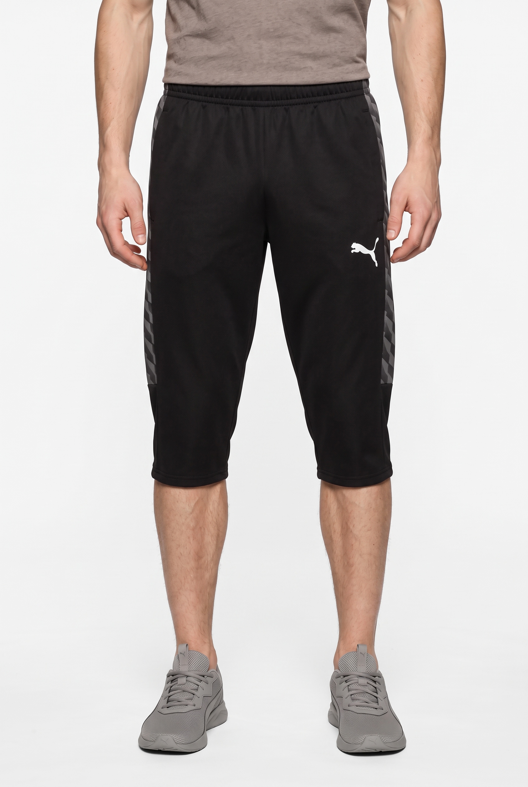Image of PUMA Trainingshose "TEAMLIGA26 TRAINING 34 PANTS" atmungsaktives Material, mit Reissverschlusstaschen