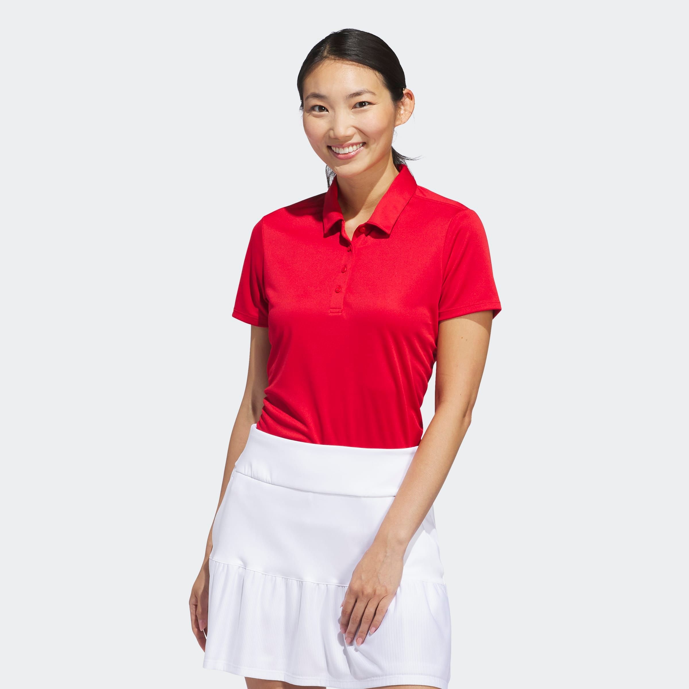 Image of adidas Performance Poloshirt "SOLID PERFORMANCE SHORT SLEEVE FÜR DAMEN" mit Druckknopfverschluss, aus Polyester, leichtes Pikeematerial