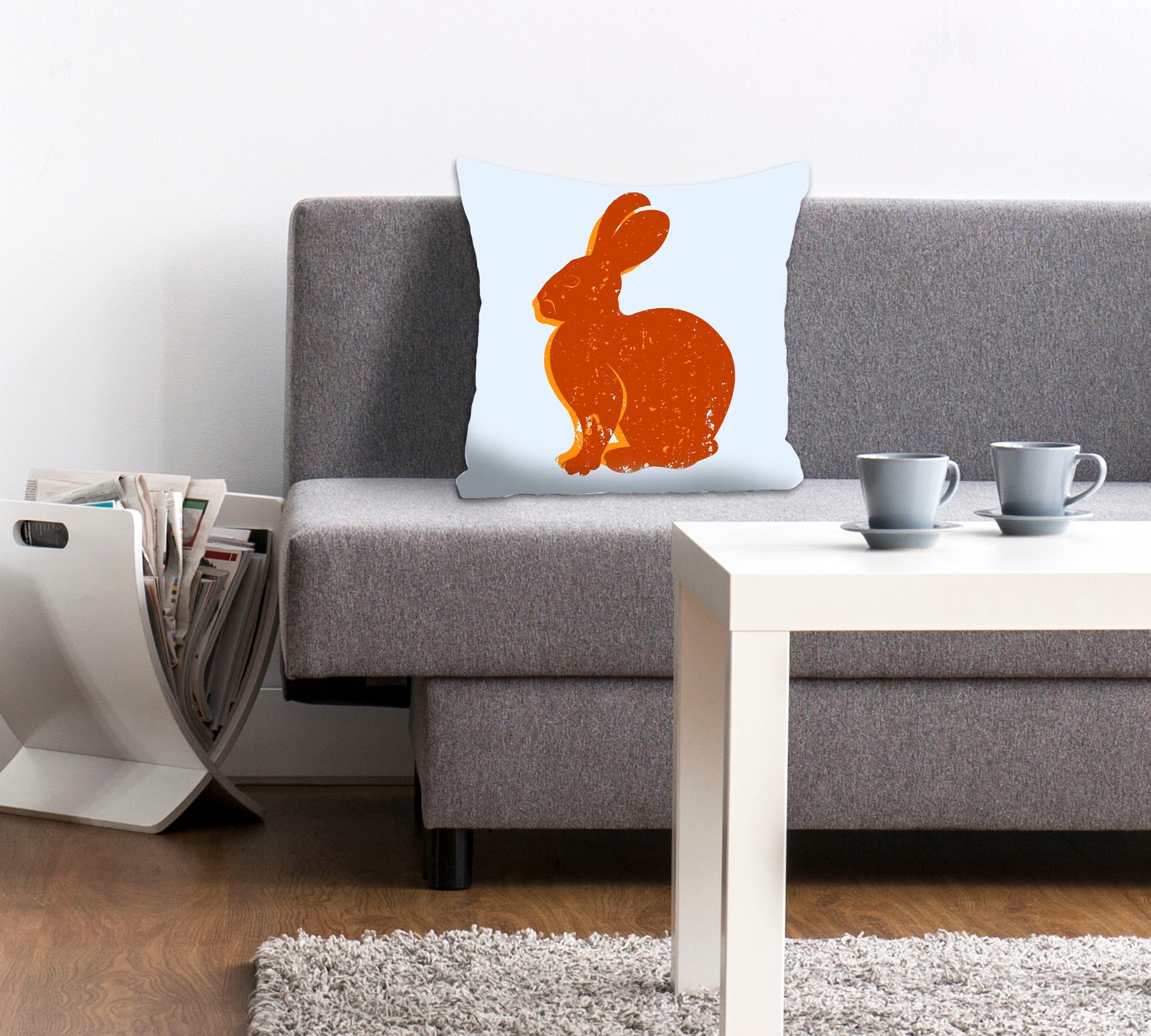 Image of queence Dekokissen "Lindt" mit einem orangenen Hasen