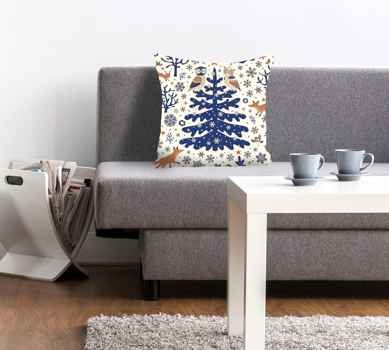Image of queence Dekokissen "Klaas" mit einem blauen Tannenbaum im Schnee