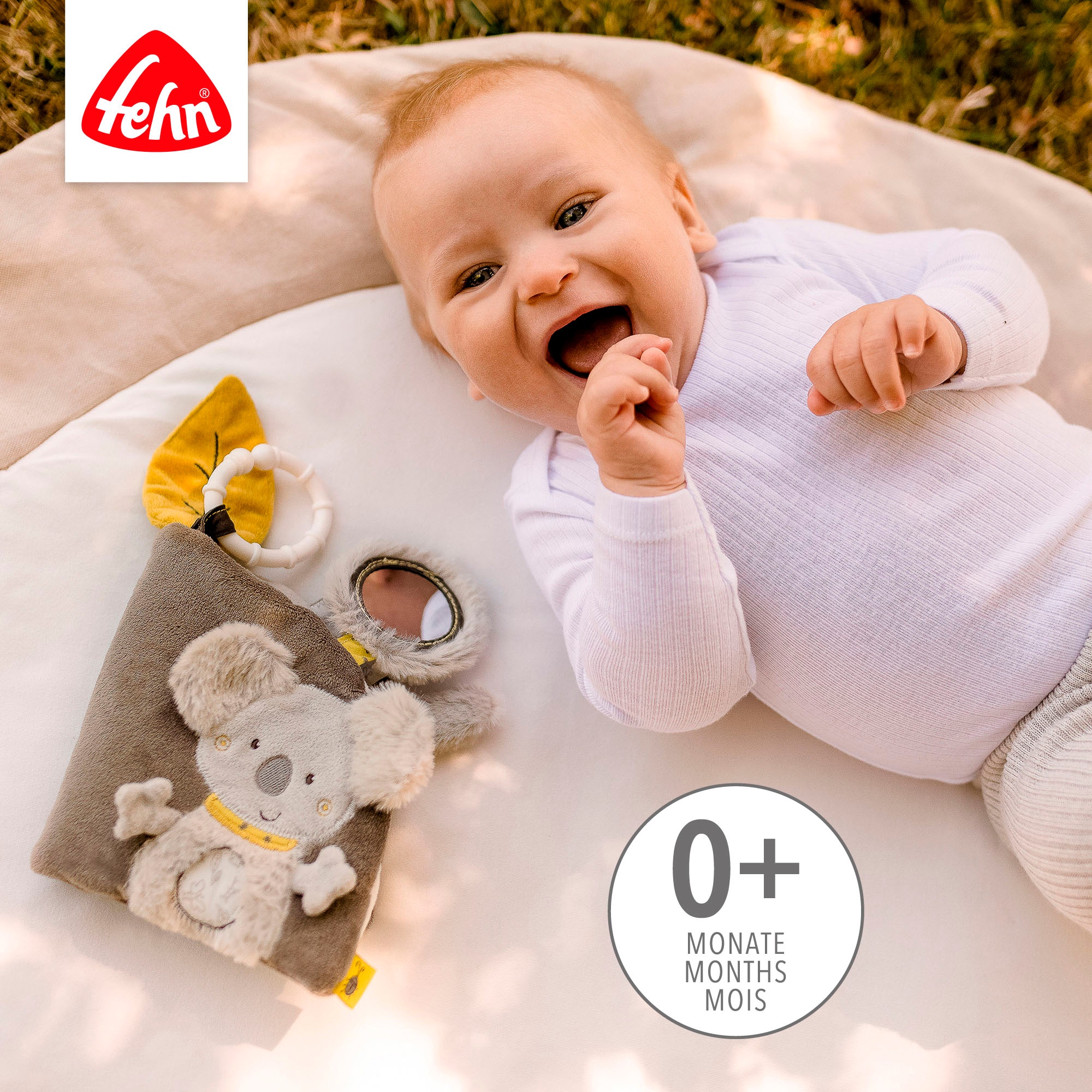 Fehn Greifspielzeug »Australia, Stoffbuch«, mit Ring zur Befestigung an Kinderwagen, Babyschale oder Bett