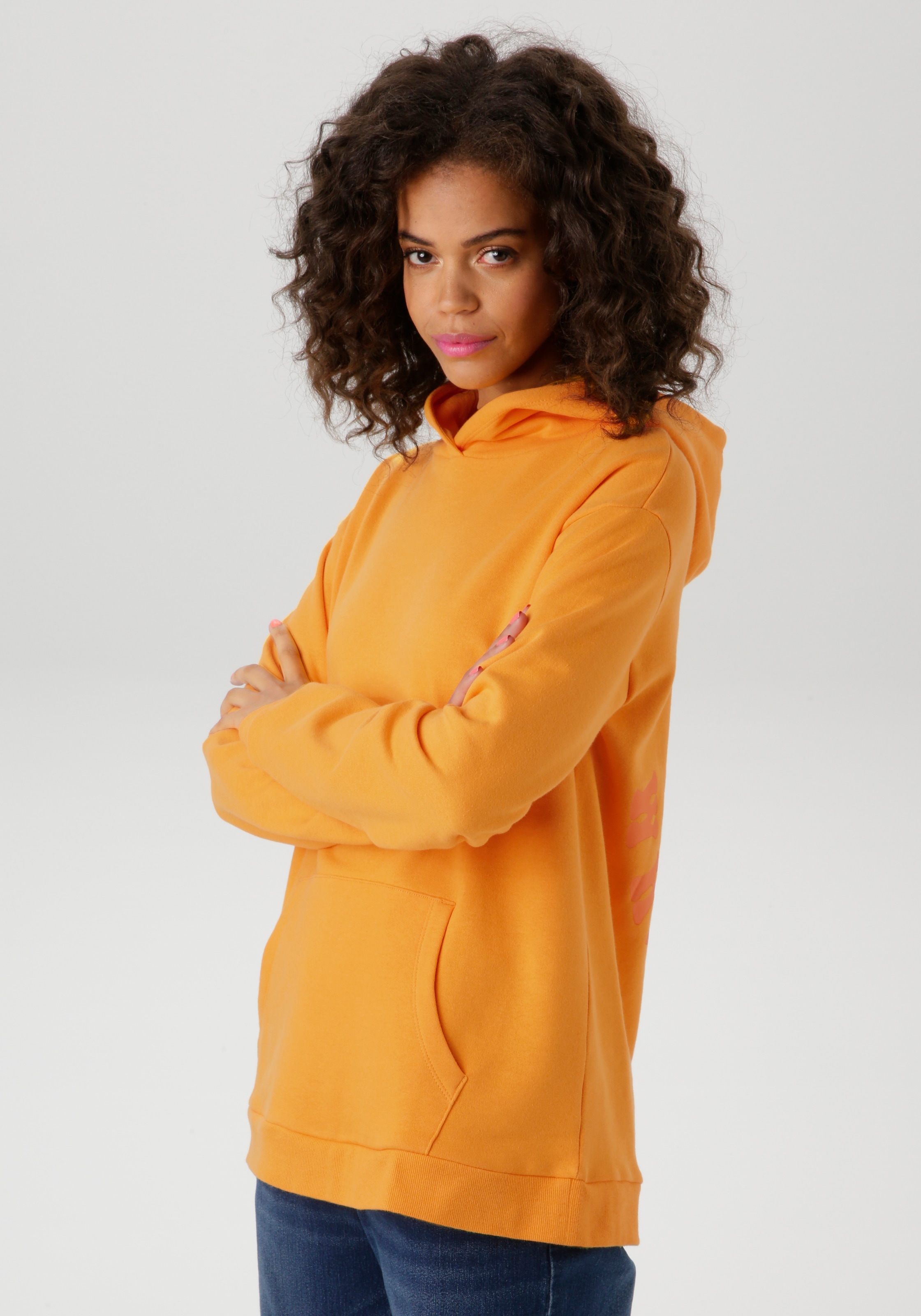 Image of Aniston CASUAL Kapuzensweatshirt, mit Smiley im Rücken