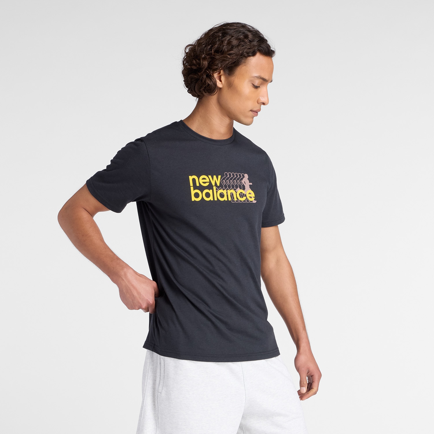 Image of New Balance Trainingsshirt "Heathertech Graphic T-Shirt 2 BLACK" für sportliche Aktivitäten, sportlicher Stil, atmungsaktiv