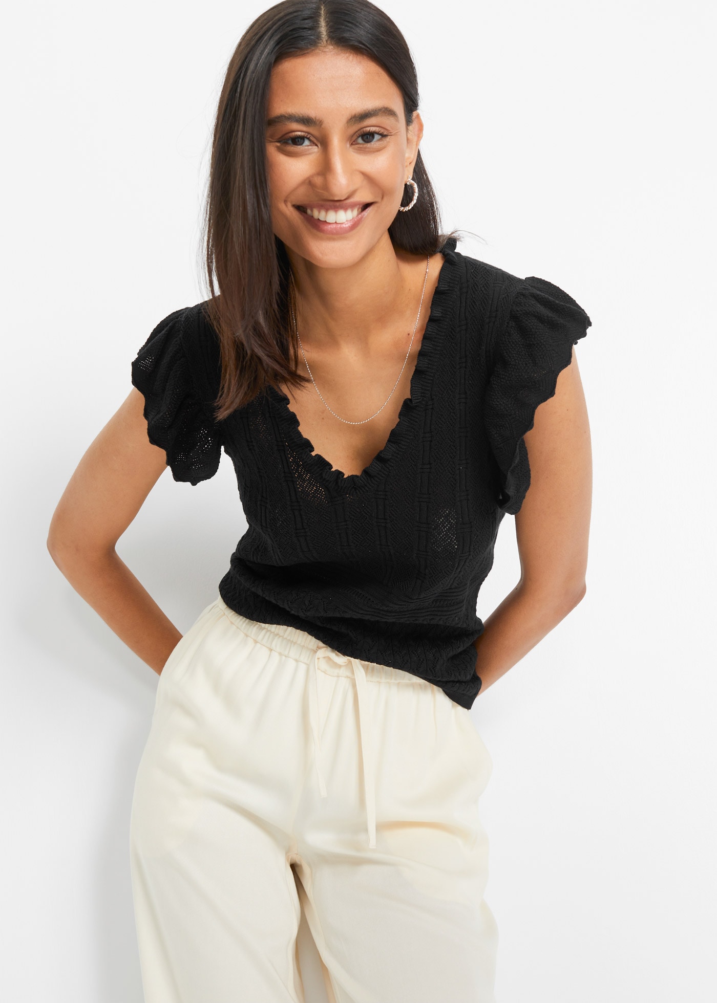 Image of bonprix Strickpullover Ajour-Strick mit hohem Viskoseanteil, ärmellos mit Volant