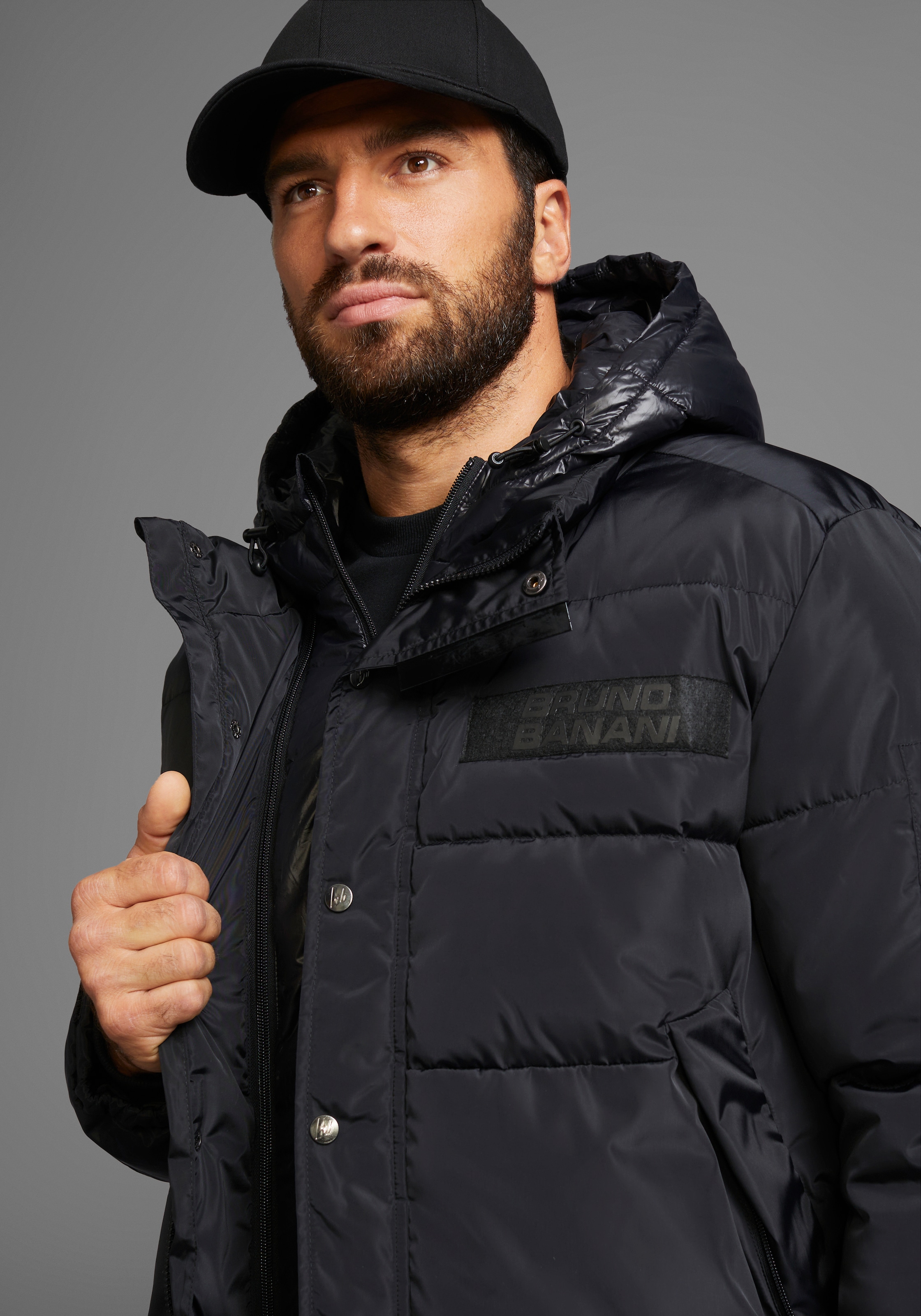 Bruno Banani Winterjacke, mit Kapuze, wärmendes Material, hochschliessender Kragen, verstellbare Kapuze