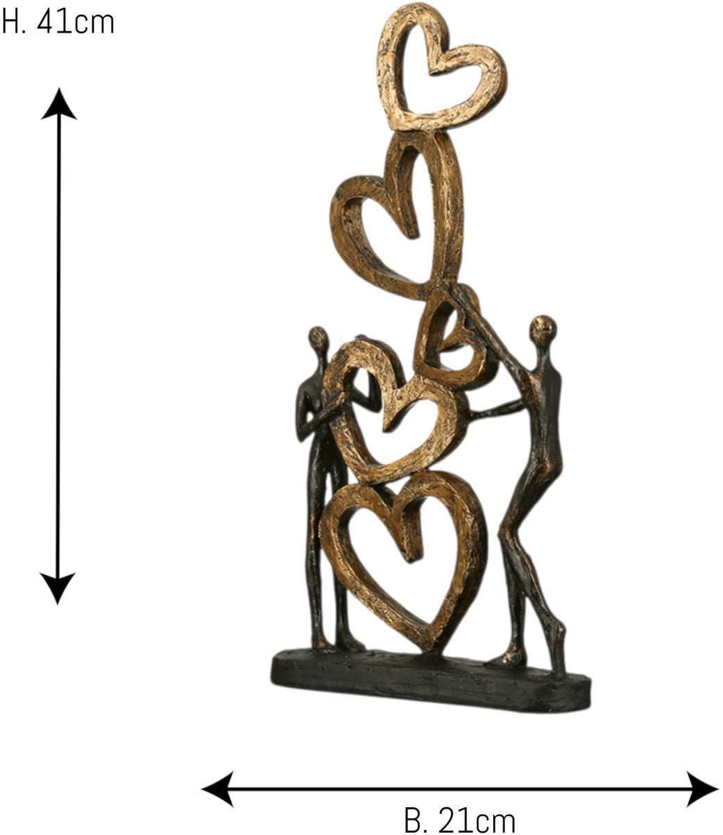 Casablanca by Gilde Figurine de décoration »Skulptur Herz auf Herz, gold/schwarz« Objet déco, hauteur 41, salon