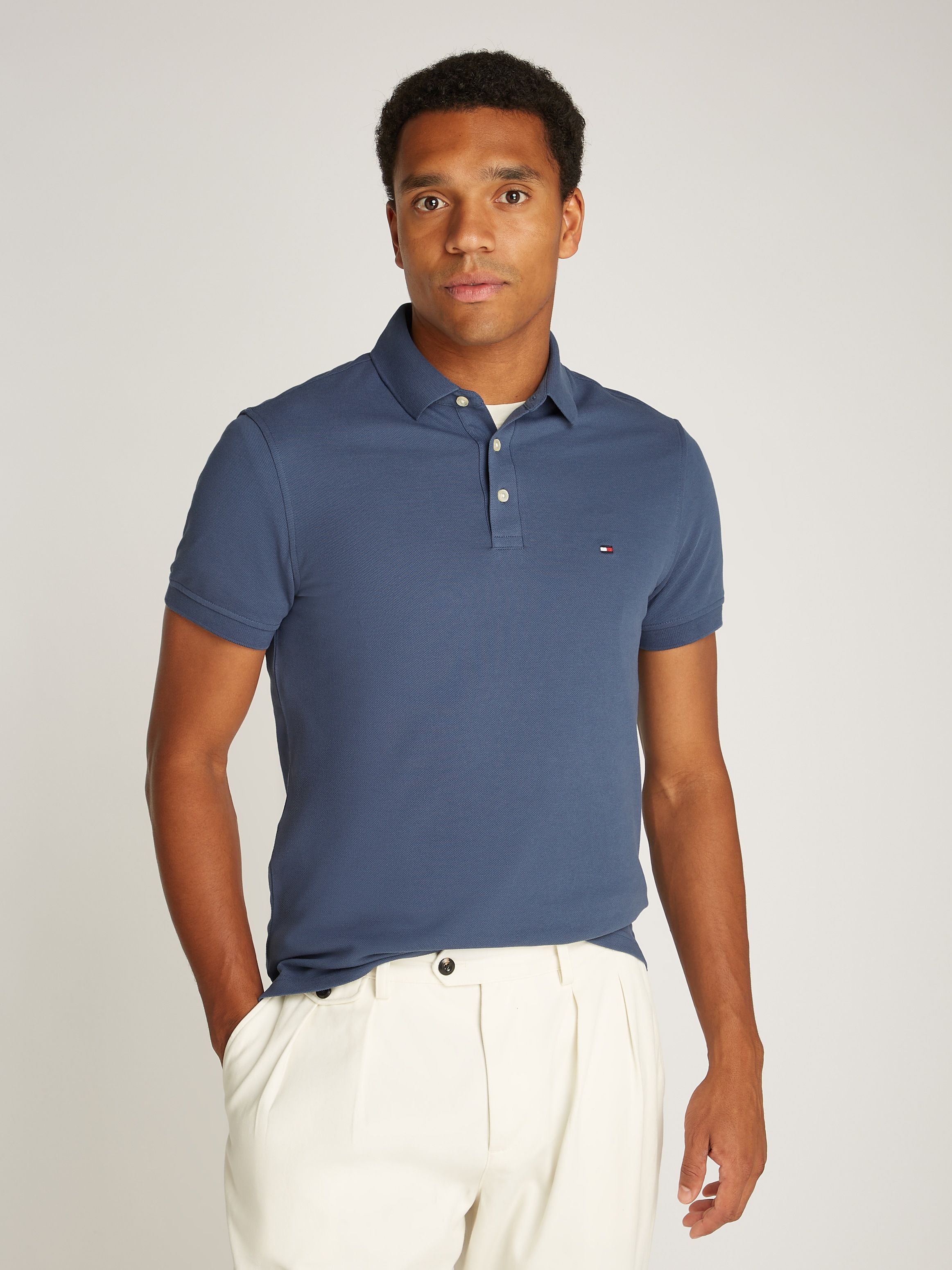 Tommy Hilfiger Poloshirt »1985 SLIM POLO mit Piqué-Struktur und Stickerei«, meliert, casual, slim fit, Baumwollmix, Polokragen