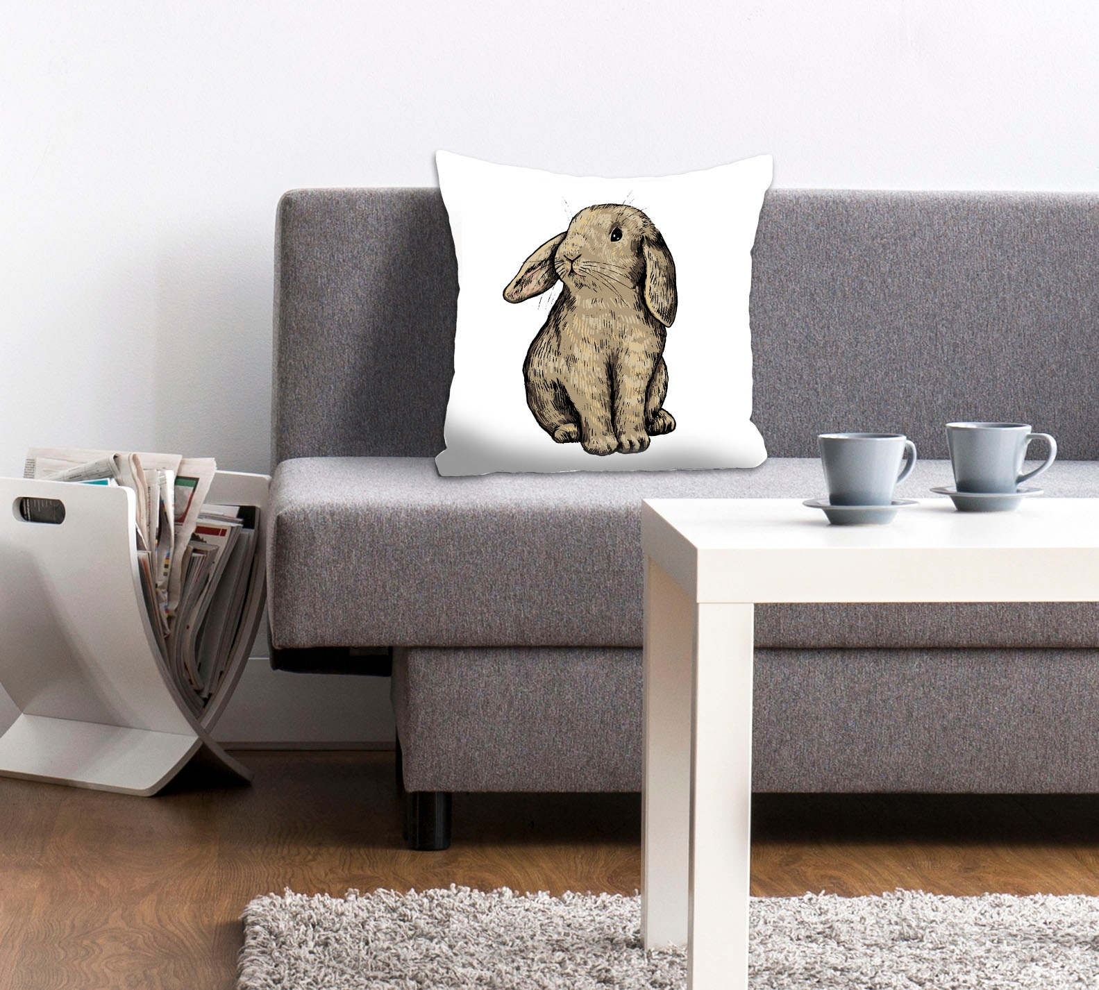 Image of queence Dekokissen "Eilert" mit einem sitzenden Hasen