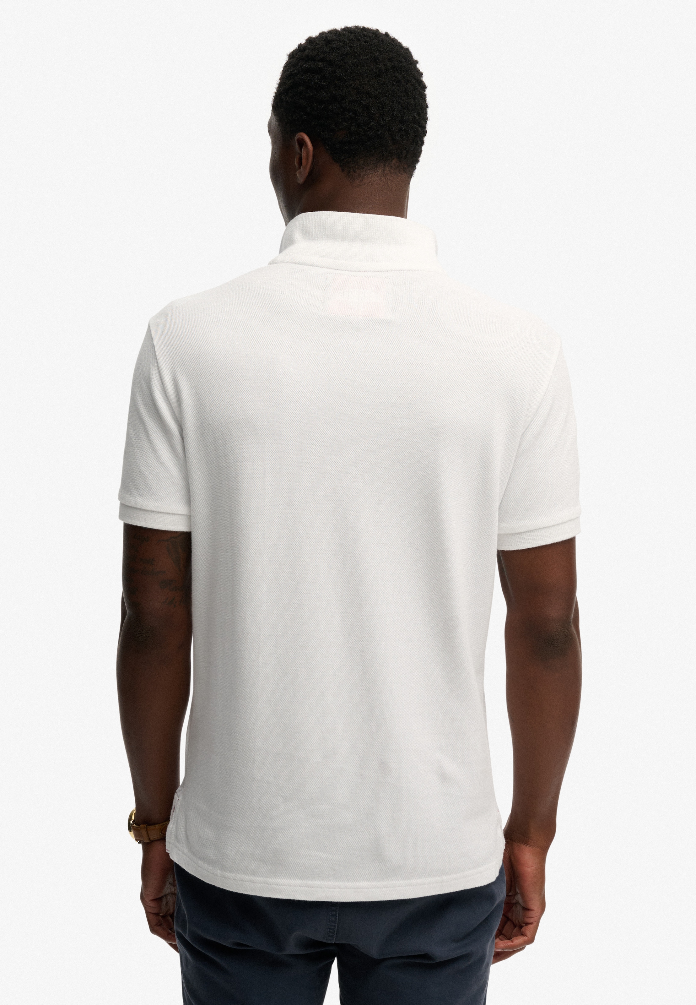 Superdry Polo »CREST POLO« mit Markenlabel, aus Baumwolle, Relaxed Fit, bedruckte Optik