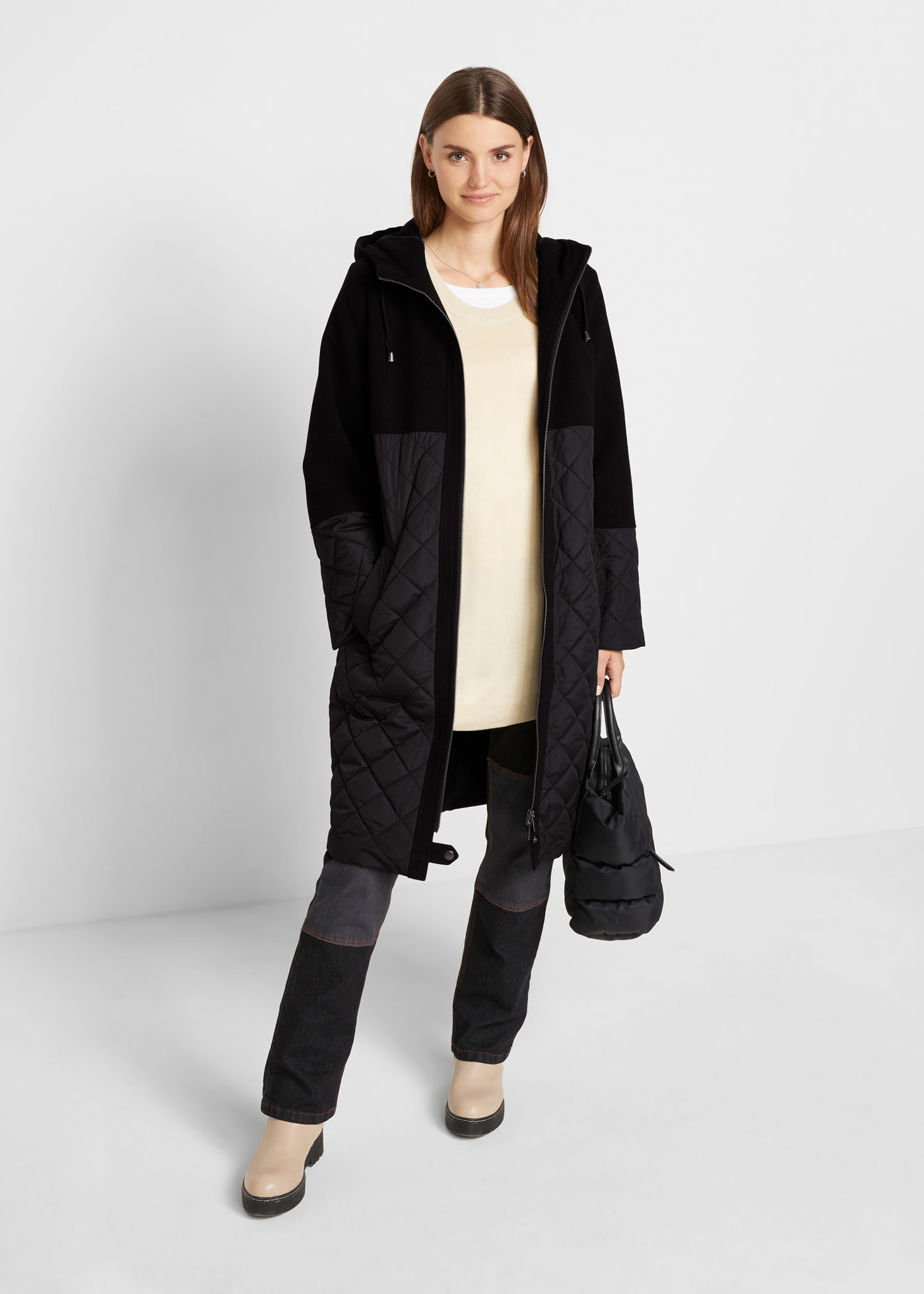 bonprix Manteau d'hiver aus Materialmix, lockere Passform, mit Stehkragen, mit Kapuze