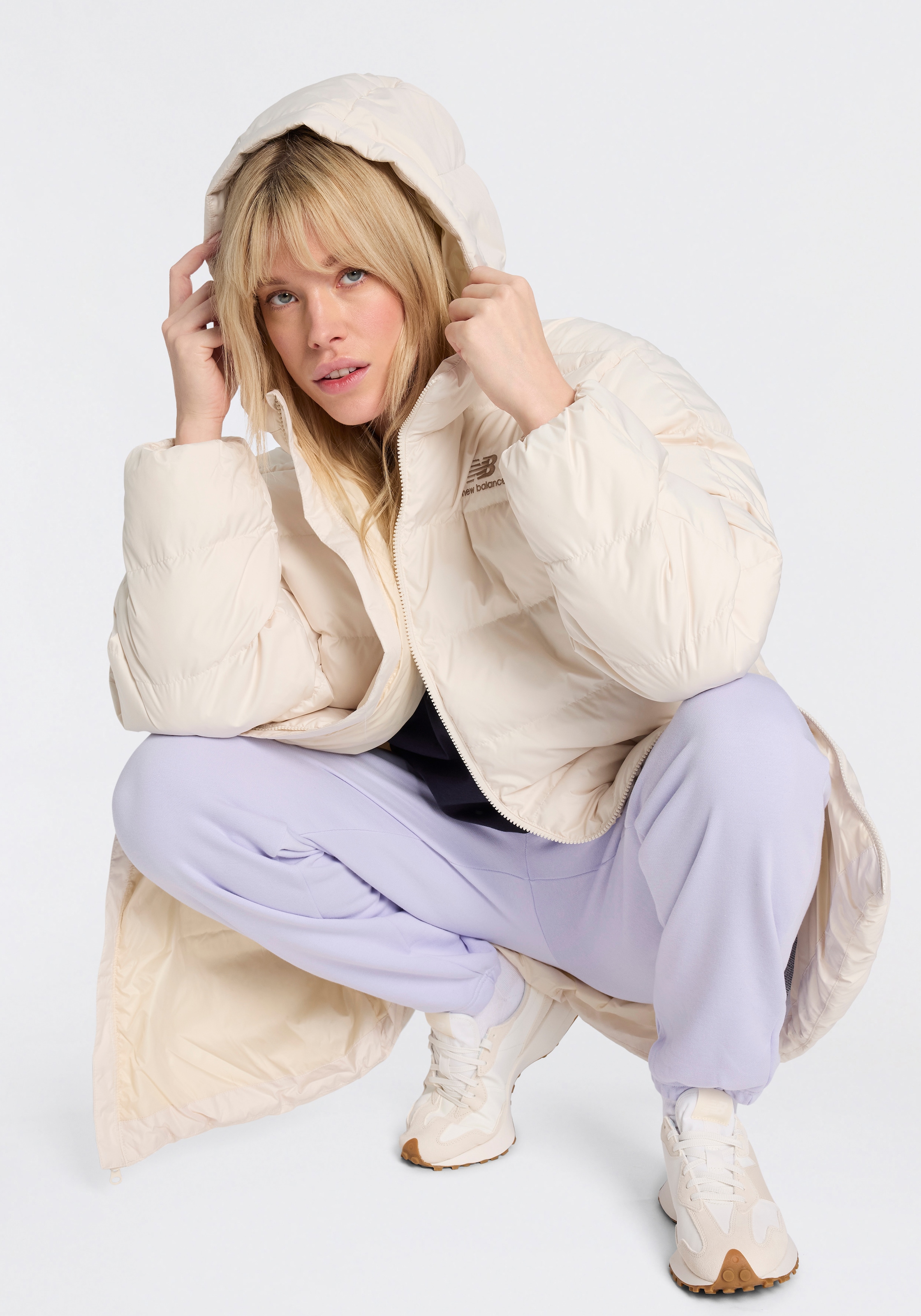 New Balance Veste matelassée »BOSTON LONG  PUFFER JACKET« avec un design matelassé remarquable, adapté pour le sport et les loisirs