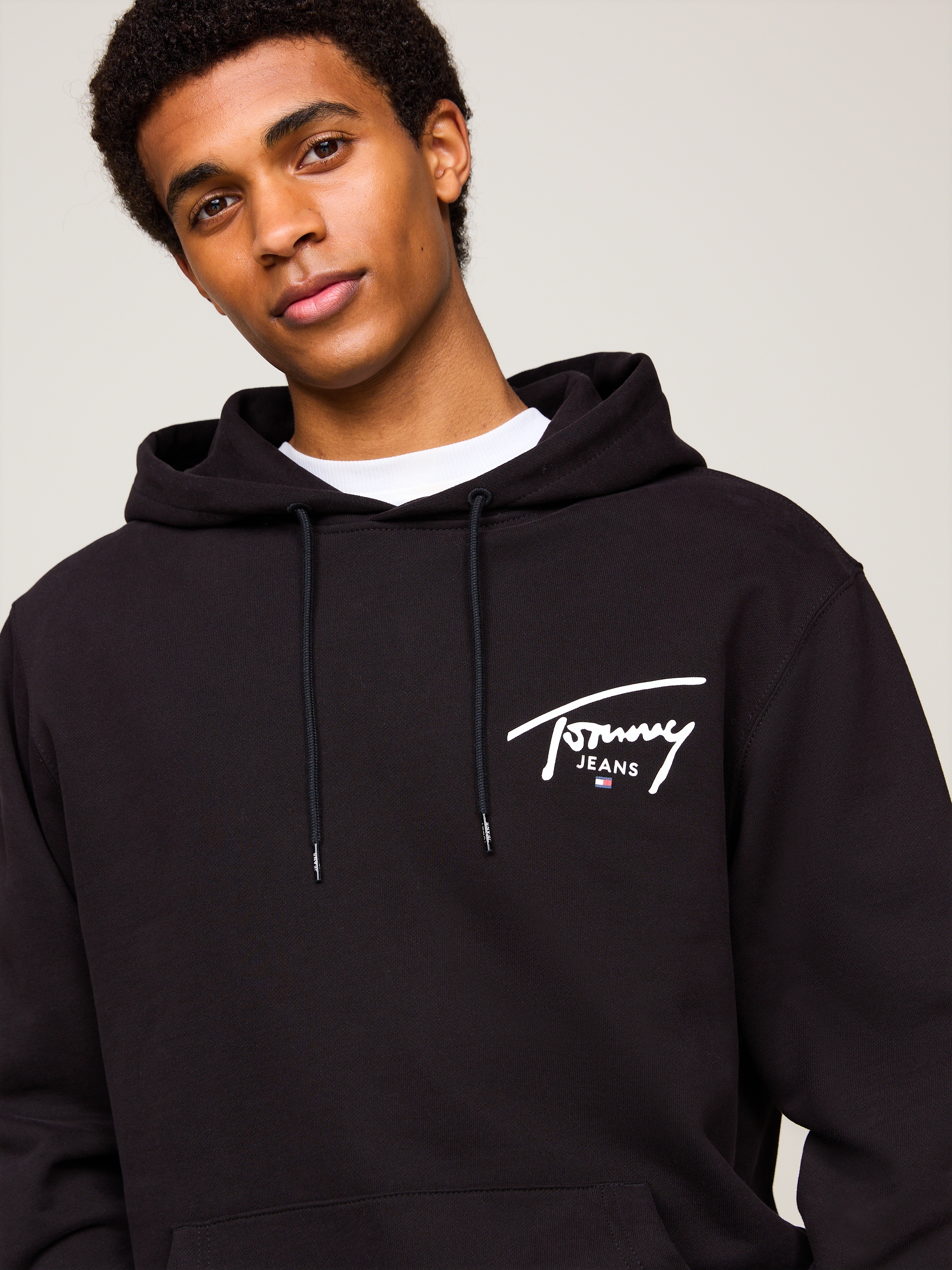 Tommy Jeans Kapuzensweatshirt »TJM REG ENTRY GRAPHIC HOODIE EXT«, mit Logoschriftzug