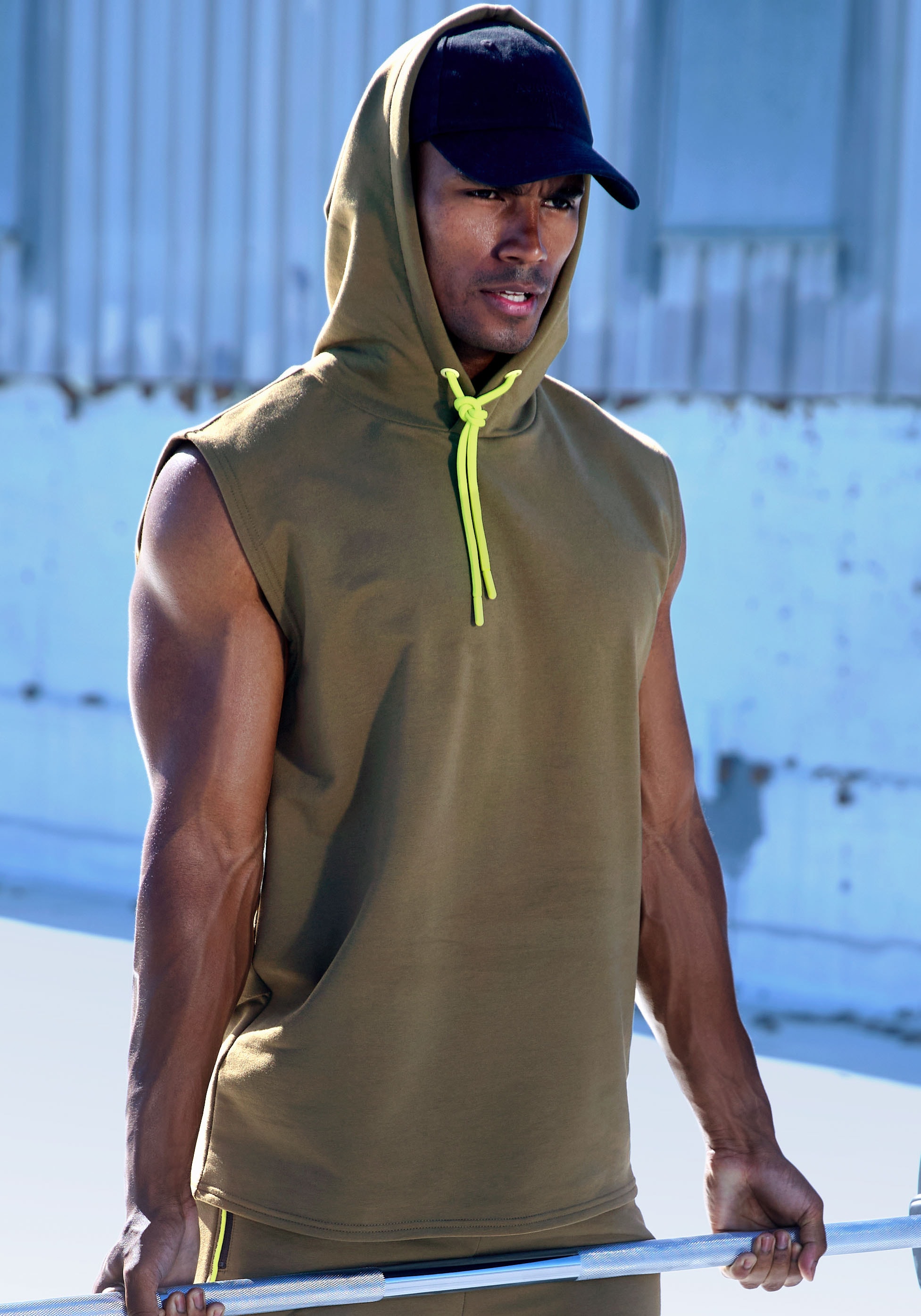 Le Jogger Performance Kapuzensweatshirt , ohne Ärmel und mit kontrastfarbenen Details
