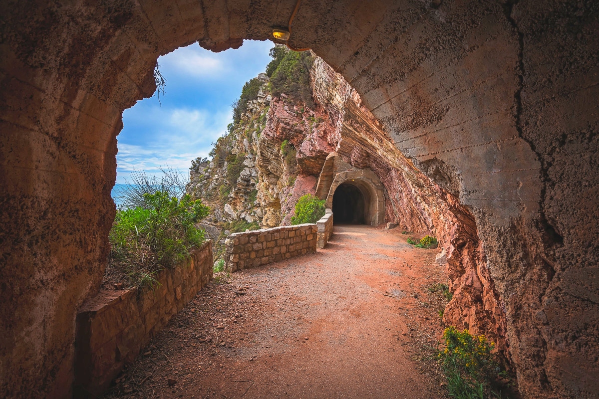 Image of Papermoon Fototapete "Felsentunnel Petrovac Bay"