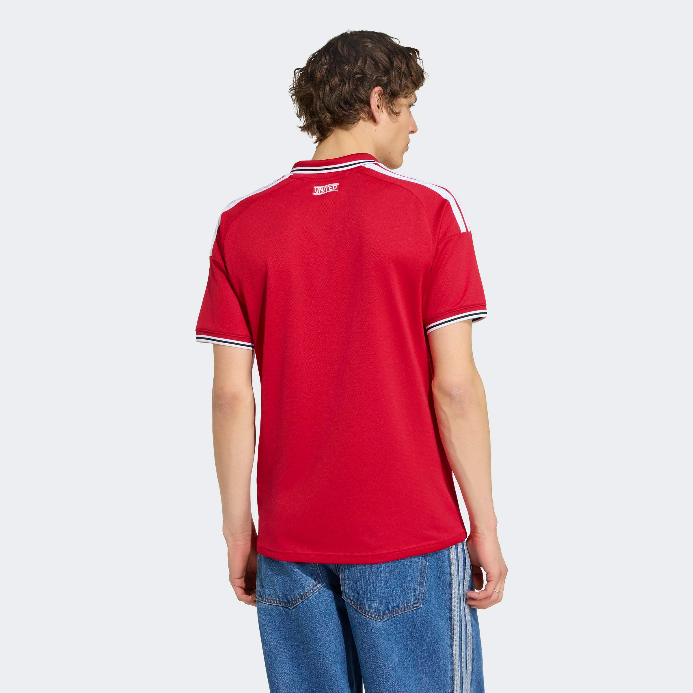 adidas Performance Fussballtrikot »MUFC H JSY« mit schmaler Passform, mit gestreiftem Kragen und Bündchen