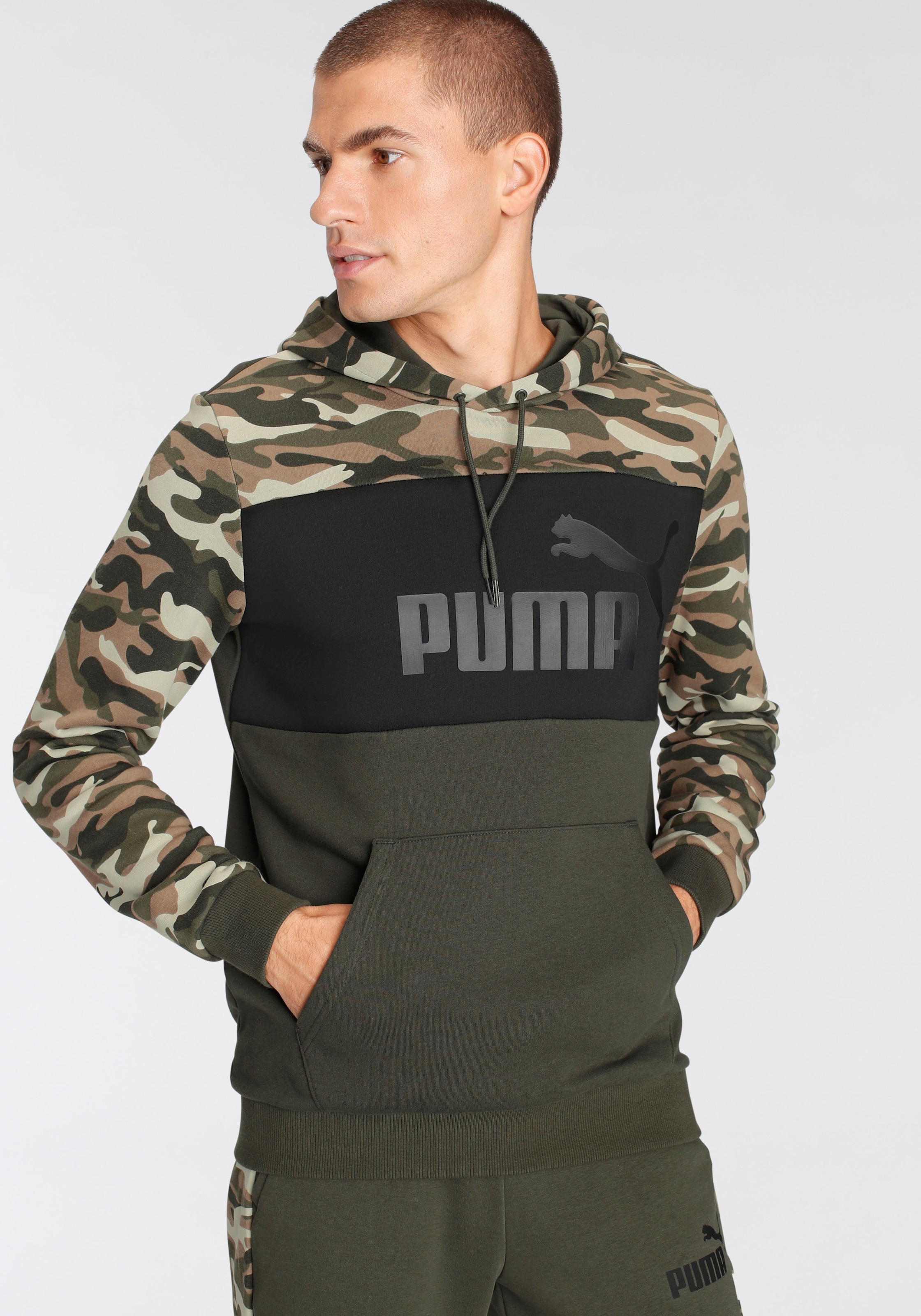 Image of PUMA Kapuzensweatshirt »ESS+ Camo Hoodie TR« bei Ackermann Versand Schweiz