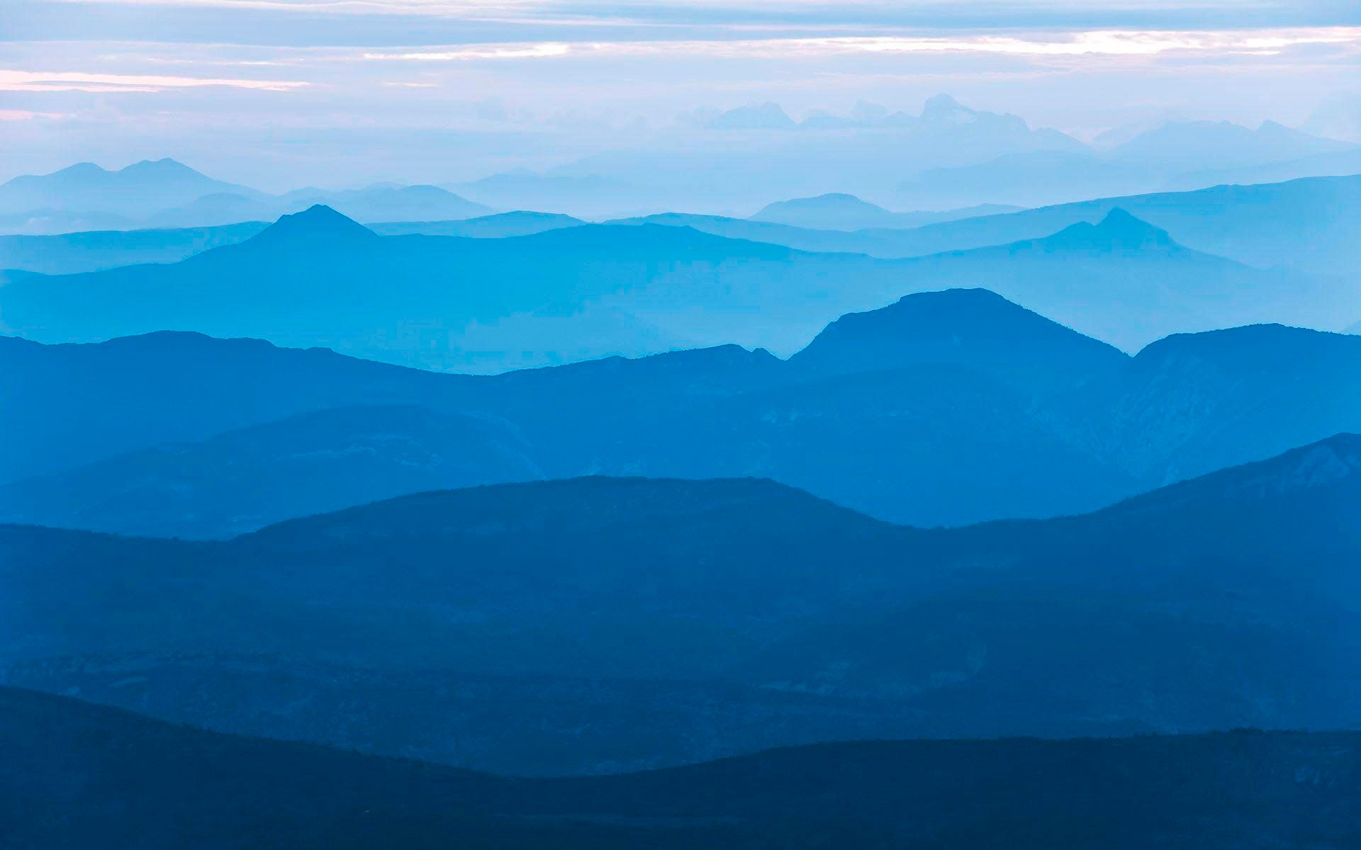 Image of Komar Vliestapete »Blue Mountain«, naturalistisch bei Ackermann Versand Schweiz