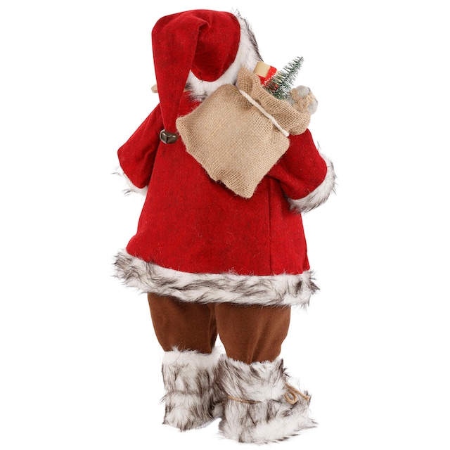 HOSSNER - HOMECOLLECTION Weihnachtsmann »Santa mit Skiern unter dem Arm und  Geschenken«, Weihnachtsdeko, Dekofigur, Weihnachtsfigur kaufen