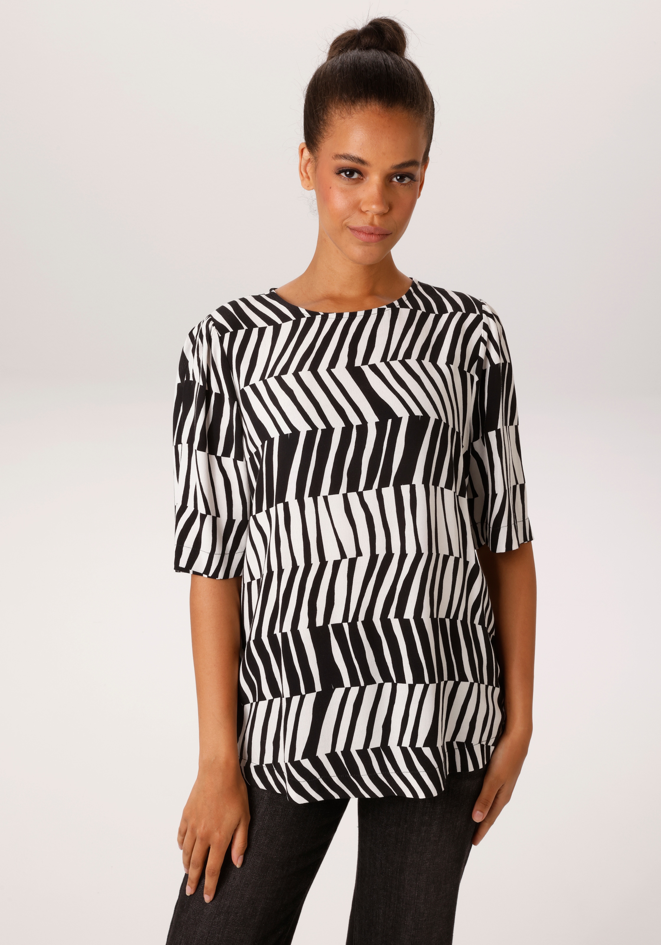 Image of Aniston CASUAL Schlupfbluse mit extravagantem Streifenmuster