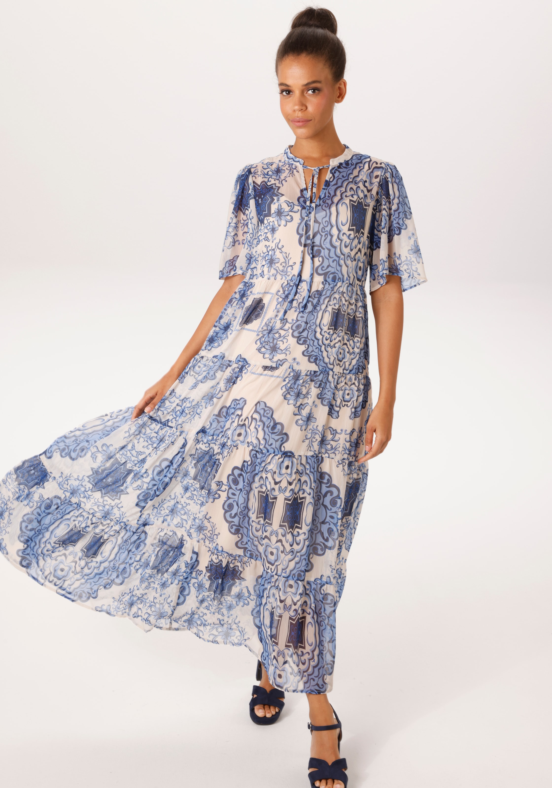 Image of Aniston CASUAL Sommerkleid mit fantasievollem, grafischen Blumendruck