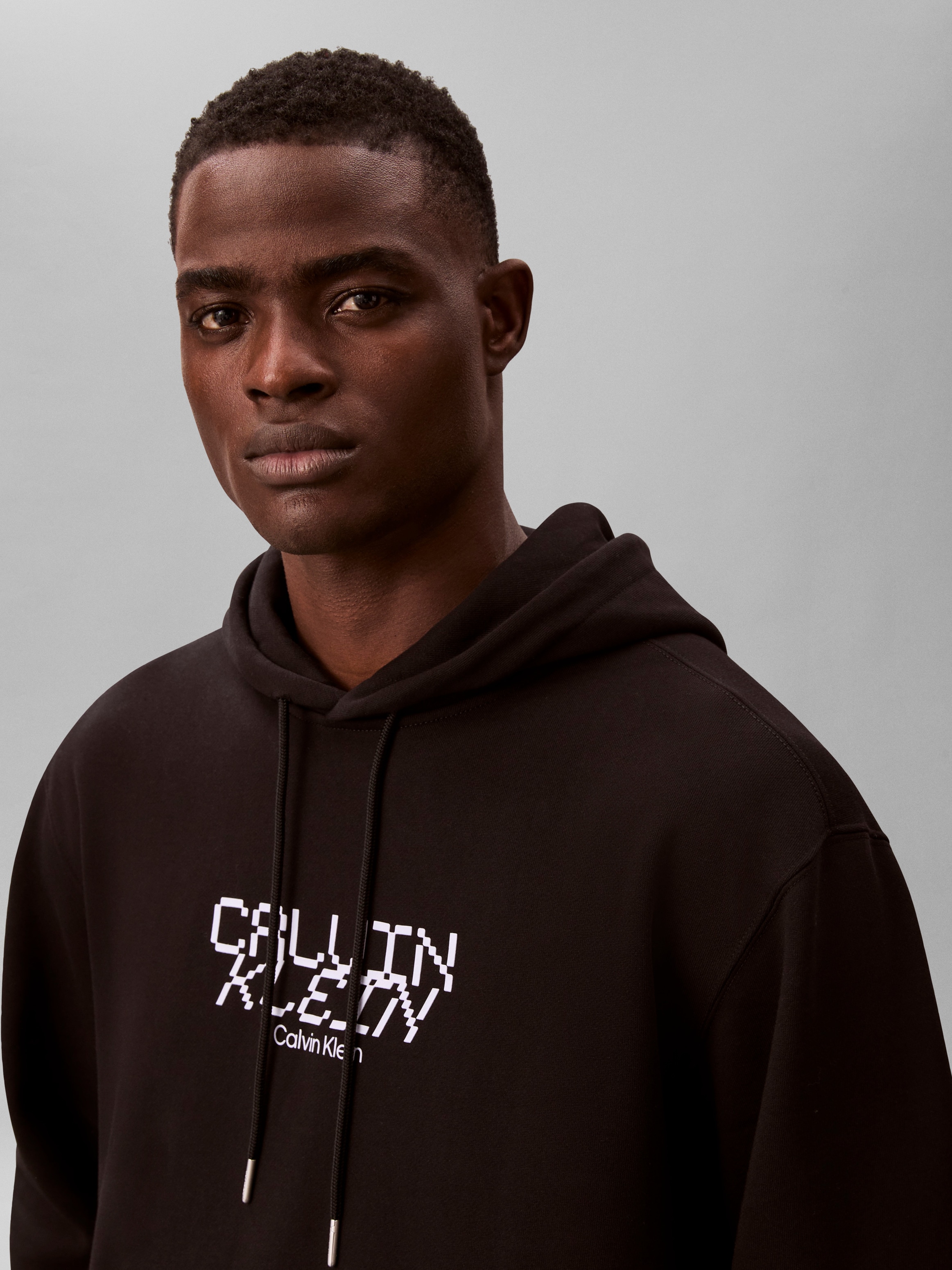 Calvin Klein Sweat à capuche , Regular Fit, Kängurutasche, Logo-Schriftzug
