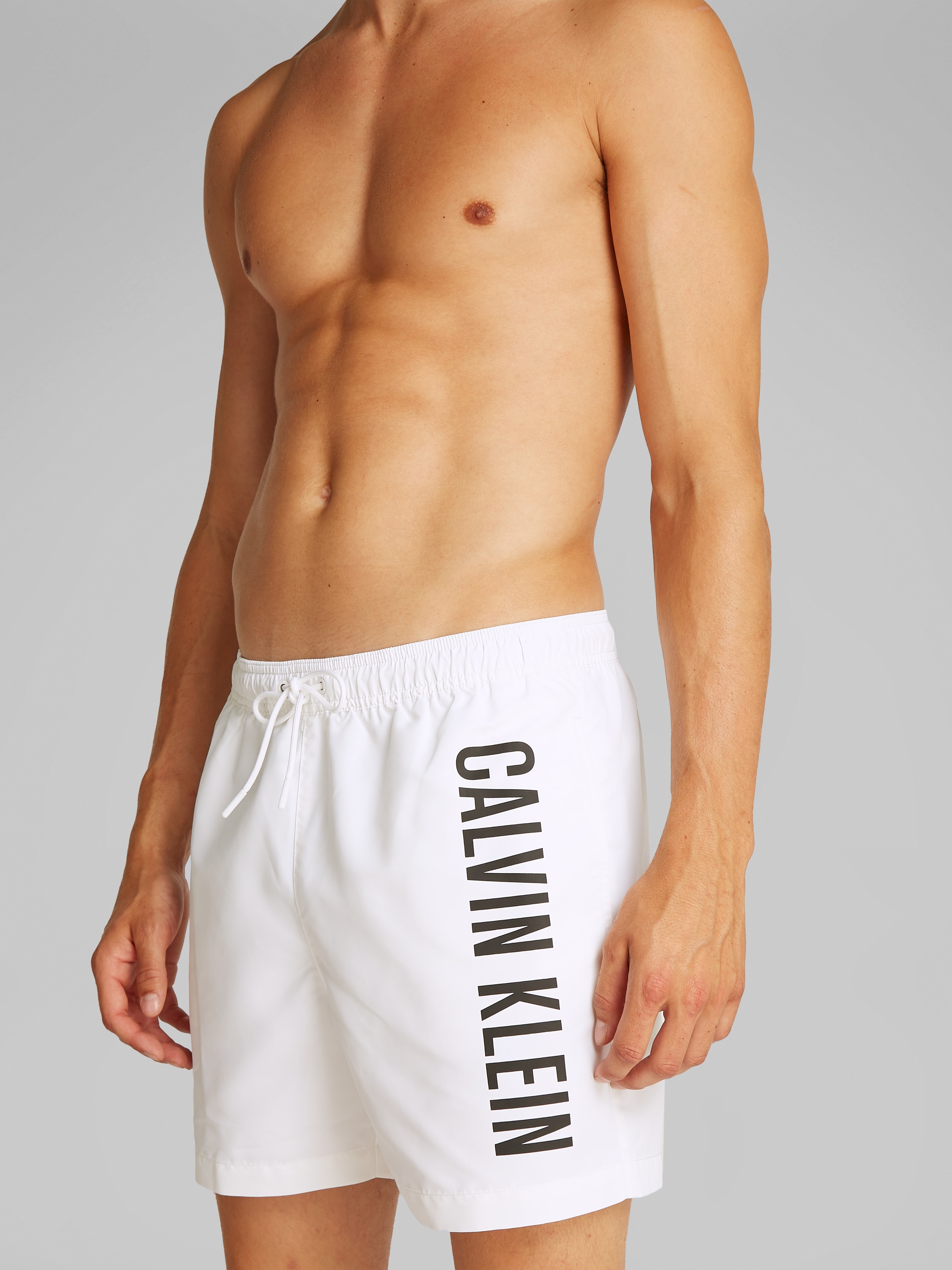 Calvin Klein Swimwear Badeshorts »MEDIUM DRAWSTRING«, mit grossem Logo