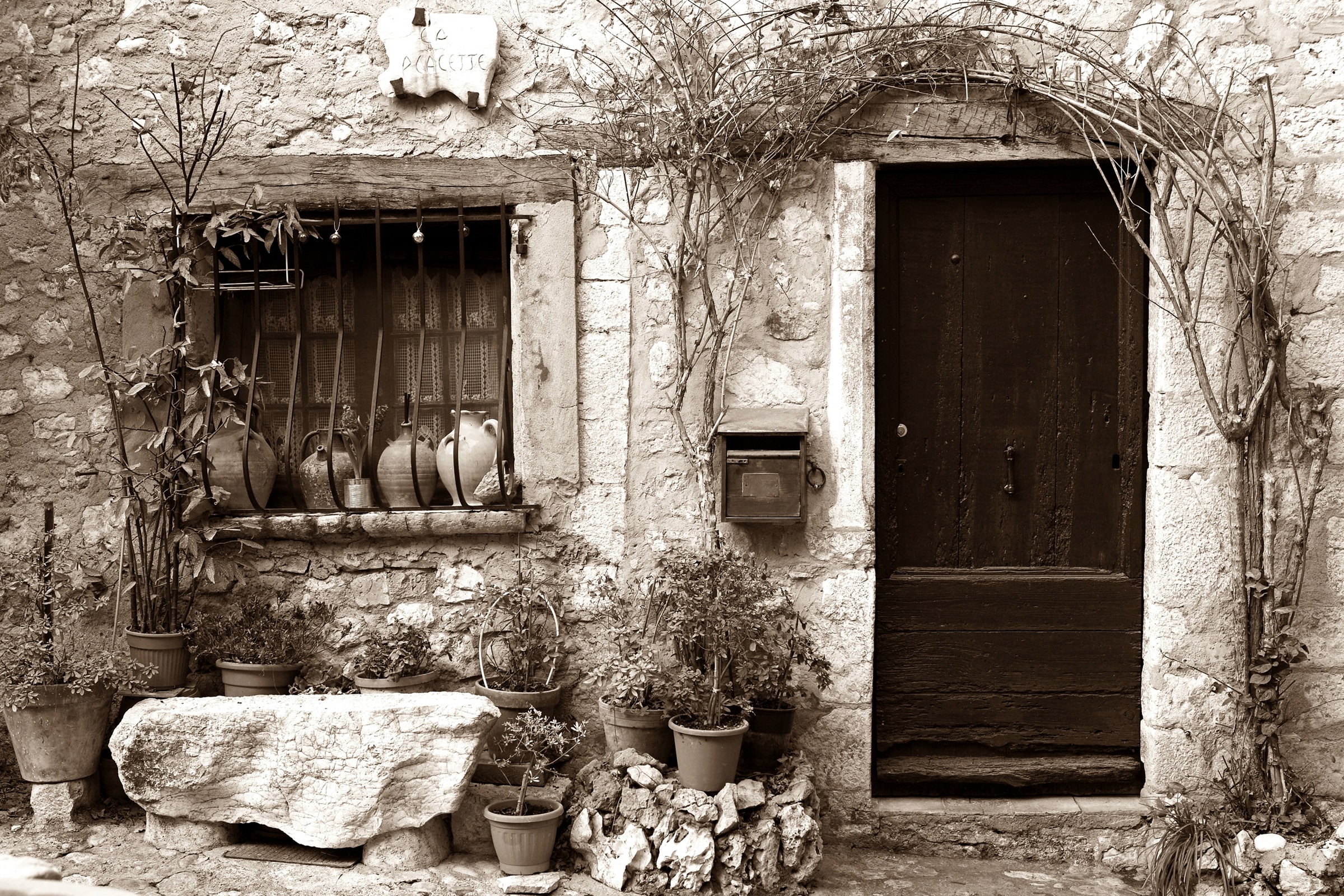 Image of Papermoon Fototapete "Haus Sepia" im schwarz-weiss Motiv