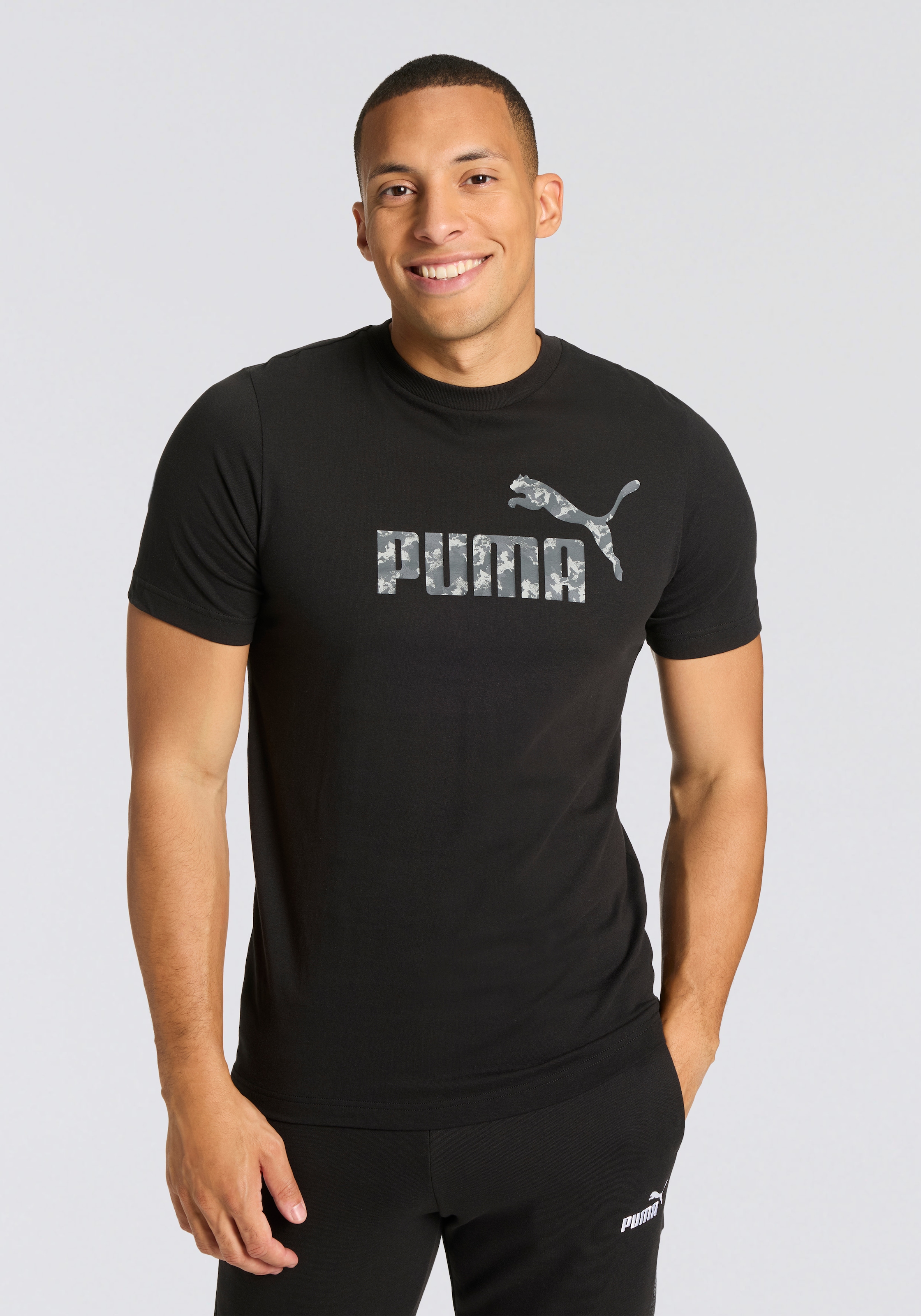 Image of PUMA T-Shirt "ESS CAMO TEE" gerade Passform, Kurzarm, für Alltag und Freizeit