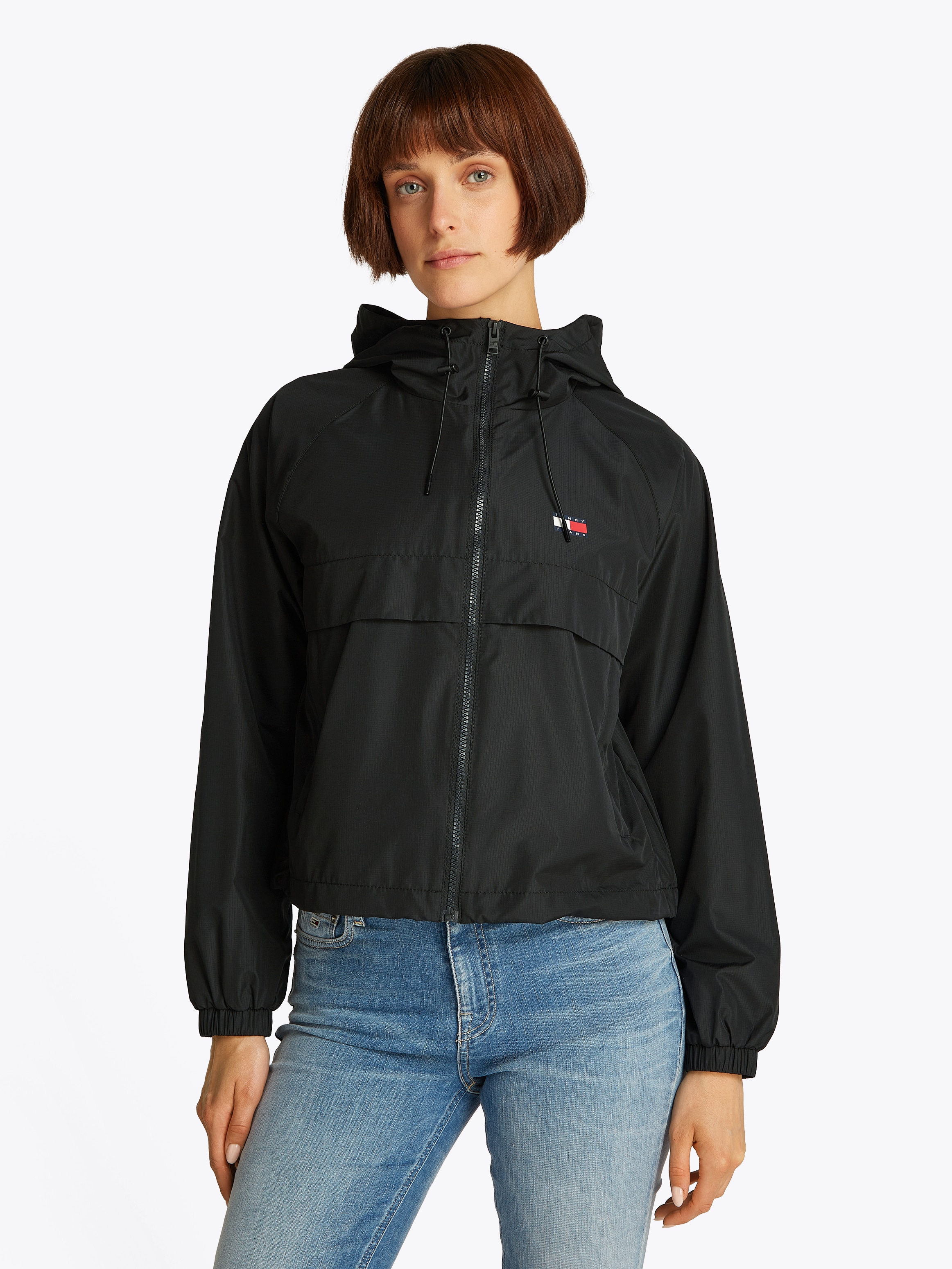 Image of Tommy Jeans Windbreaker "TJW ESSENTIAL WINDBREAKER EXT" mit Kapuze mit Logodruck