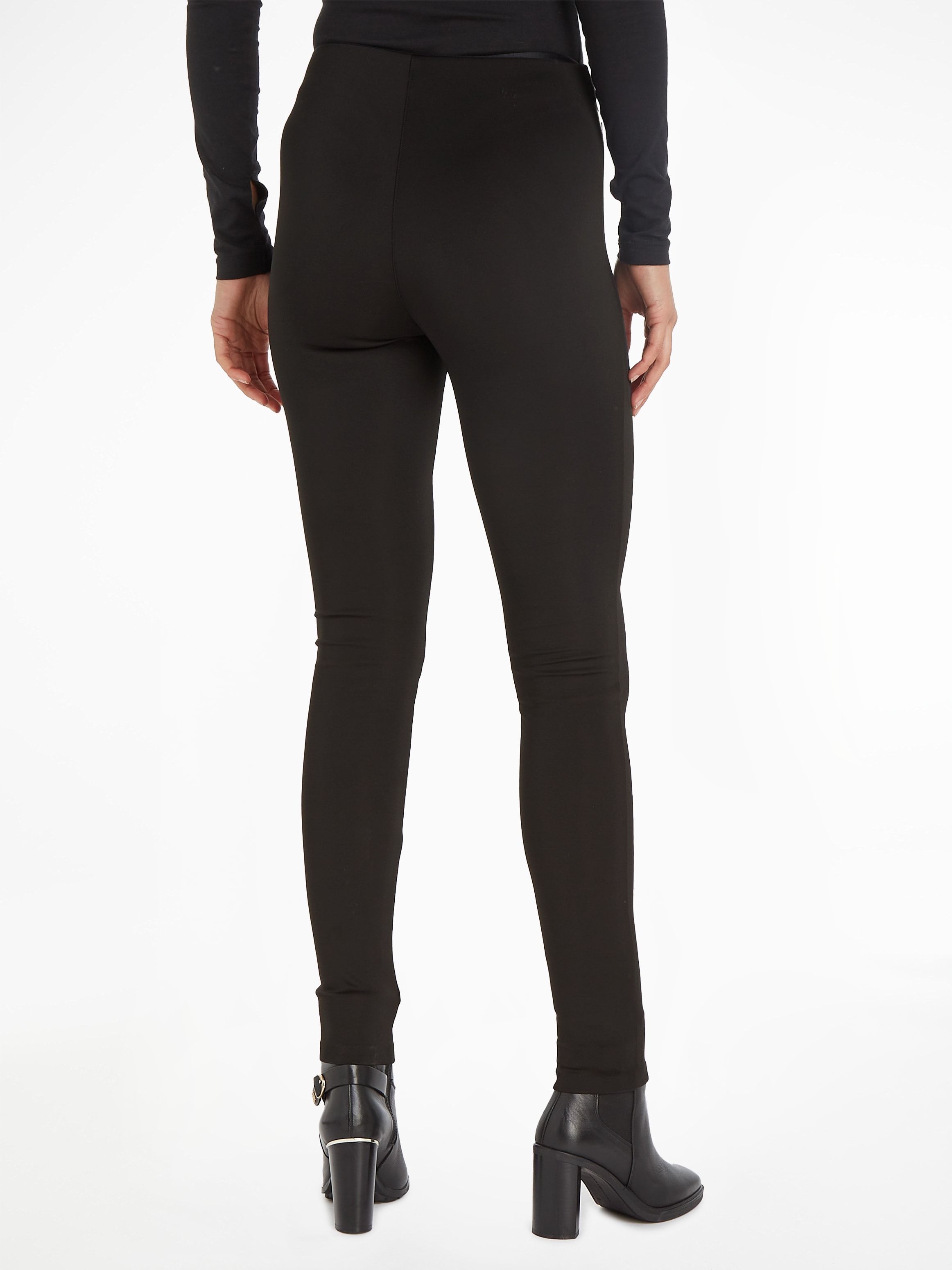 Calvin Klein Leggings »TECHNICAL KNIT LEGGING«, mit Reissverschluss am Beinabschluss