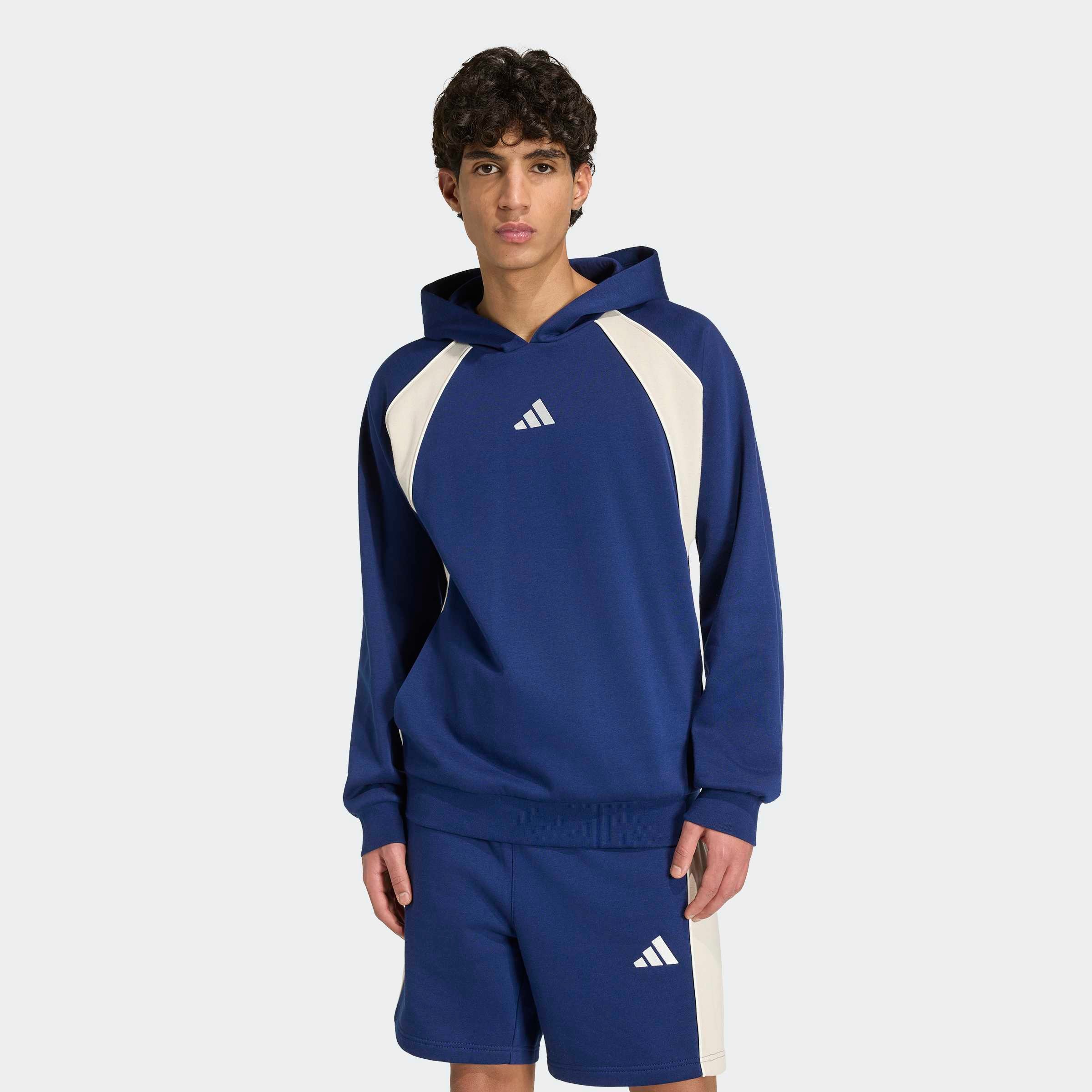 Image of adidas Sportswear Kapuzensweatshirt "SEASONAL ESSENTIALS FLEECE-HOODIE, COLOURBLOCKING", sportlicher Stil, mit Kapuze, ohne Verschluss