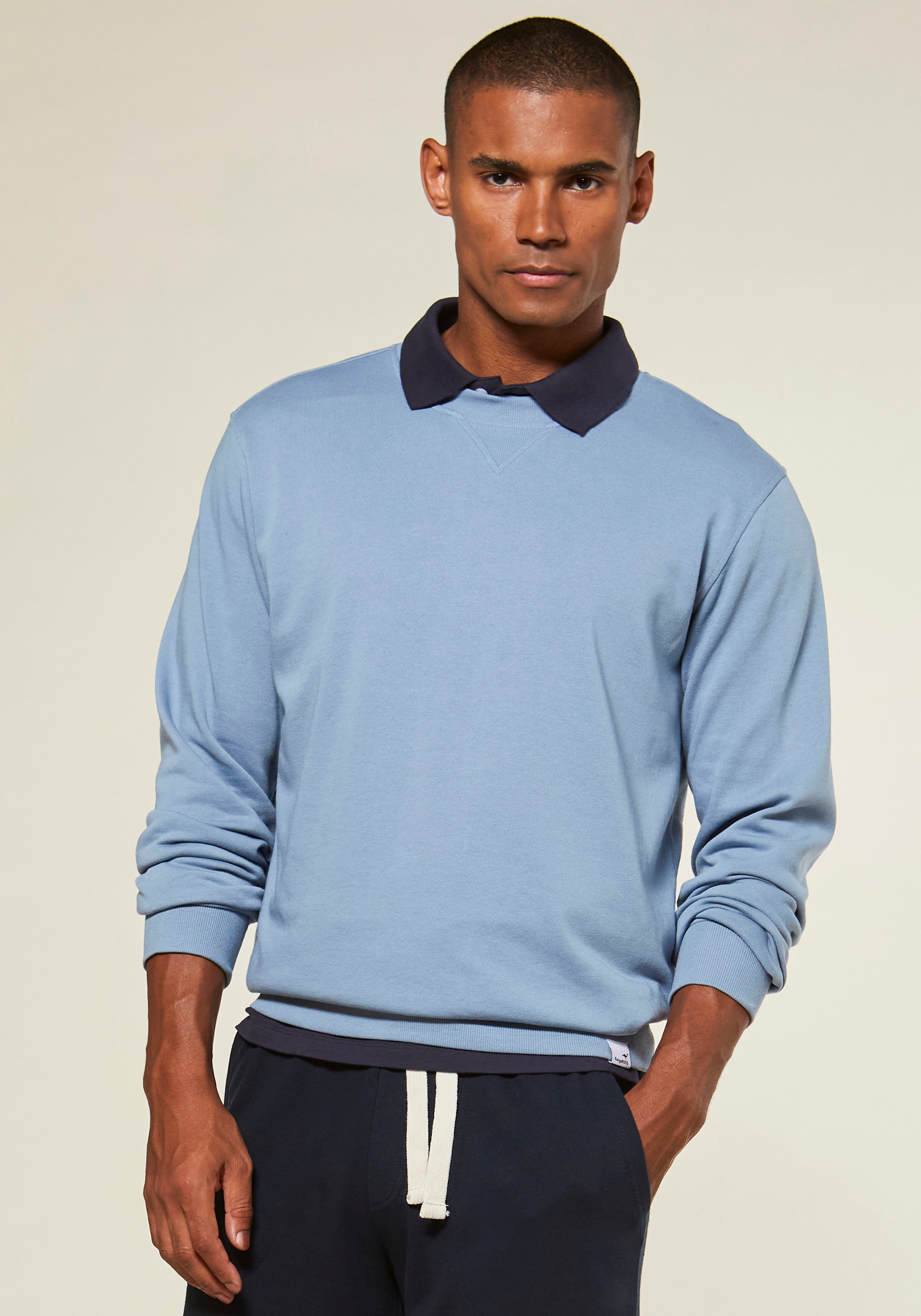 Image of KangaROOS Sweatshirt "mit Rundhalsausschnitt", mit coolem Rippeinsatz am Ausschnitt vorn