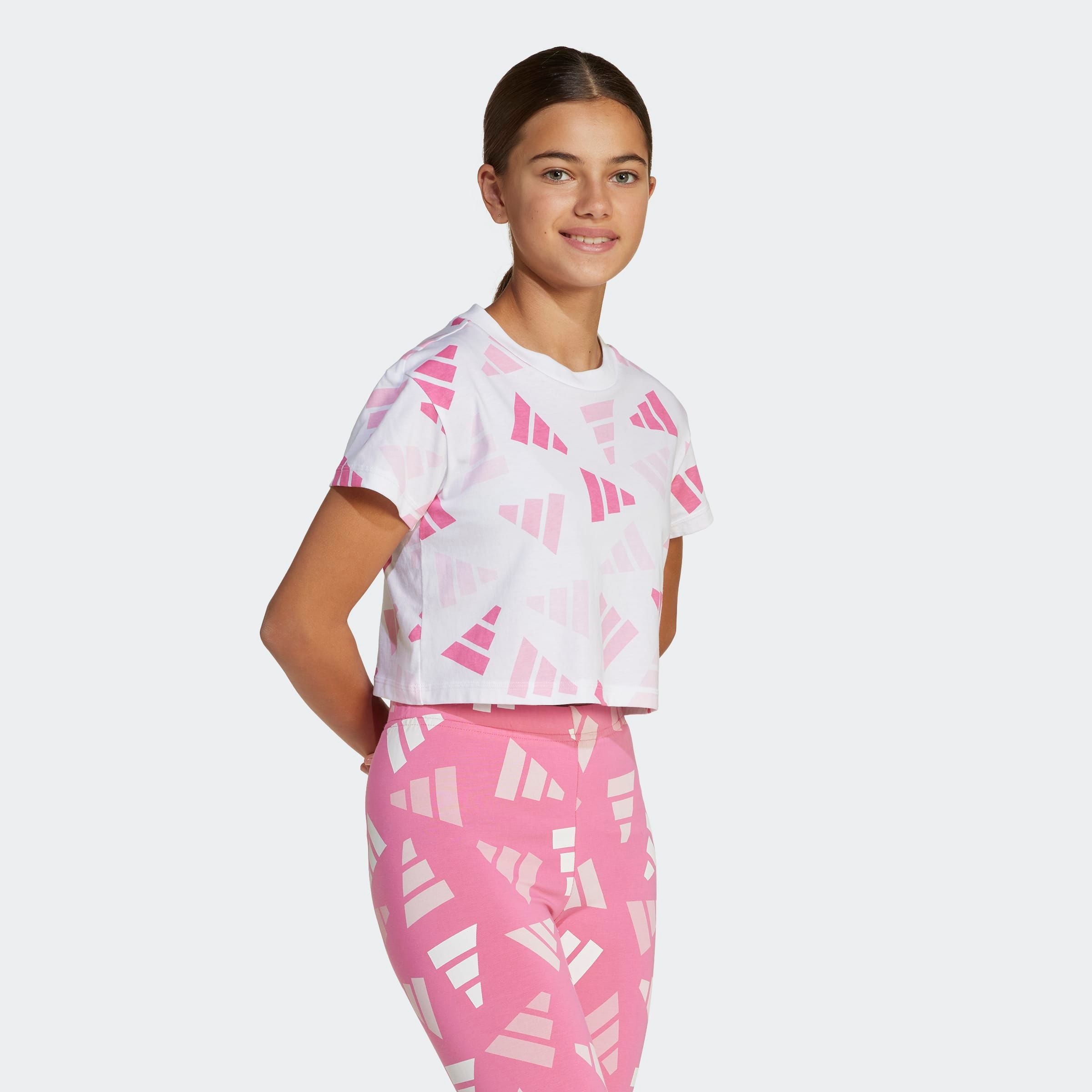 Image of adidas Sportswear T-Shirt "SEASONAL ESSENTIALS LOGO CELEBRATION KIDS" für Kinder, sportlicher Stil, Allover-Logoprint, aus Baumwolle