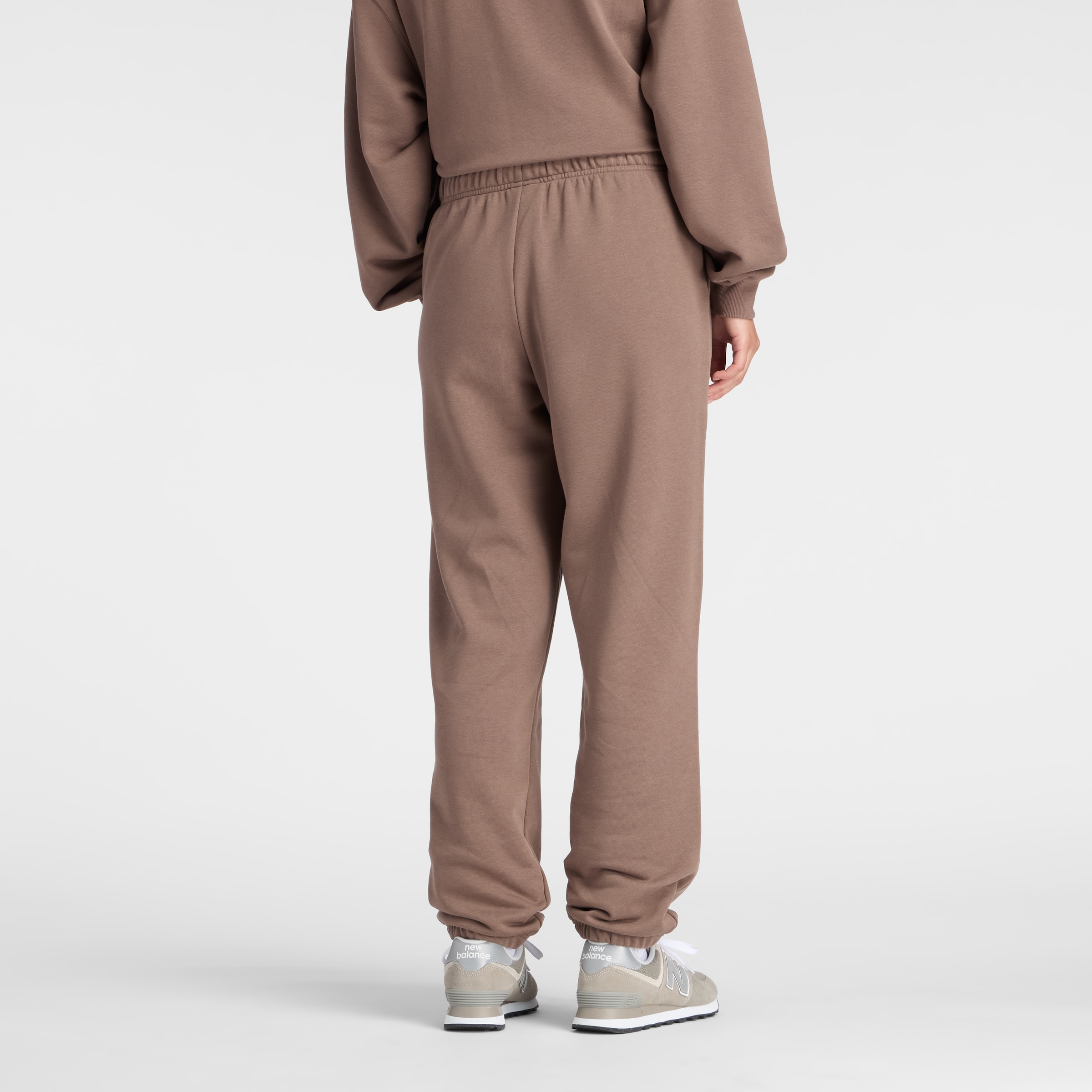 New Balance Pantalon de jogging »SPORT ESSENTIALS FRENCH TERRY JOGGER«  lockere Passform