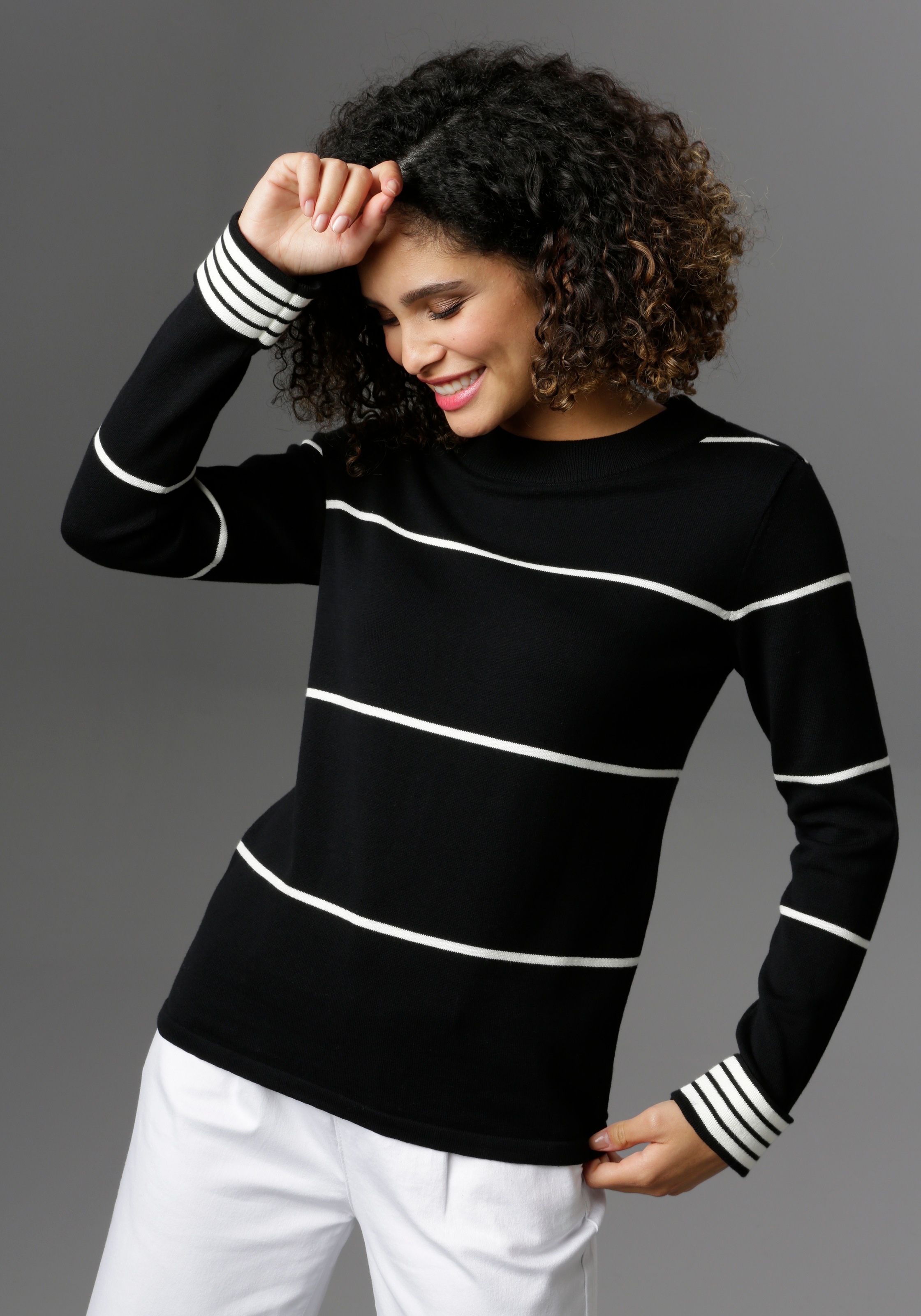 Image of Aniston SELECTED Strickpullover, mit Umschlag am Ärmel in gekonterten Streifen bei Ackermann Versand Schweiz