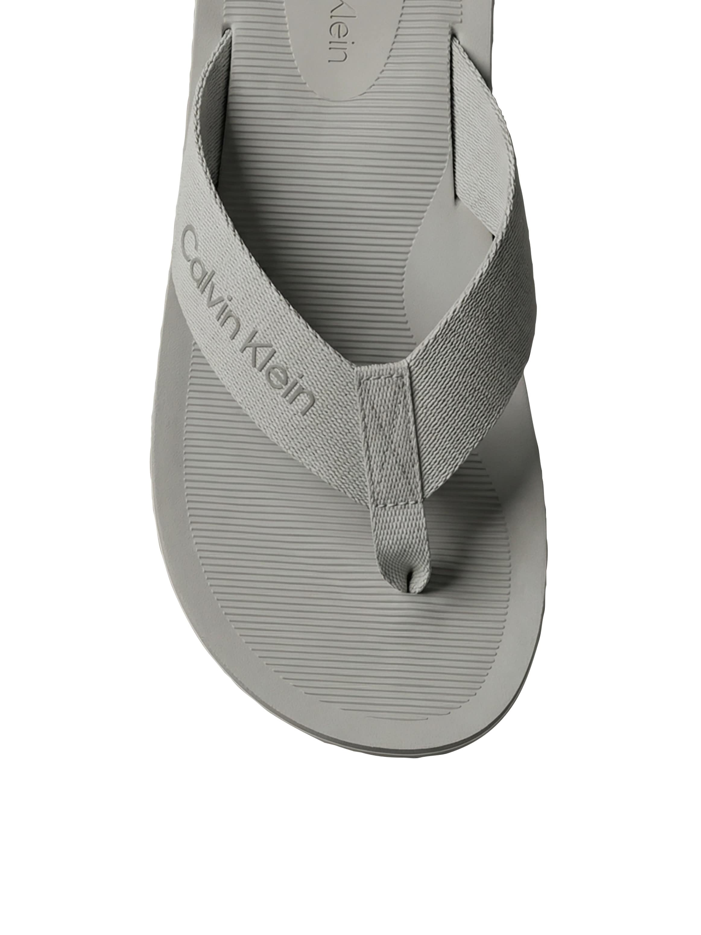 Calvin Klein Séparateur d'orteils »CITY THONG SLIDE«  chaussure de plage, pool slides, chaussure de bain, plate avec logo