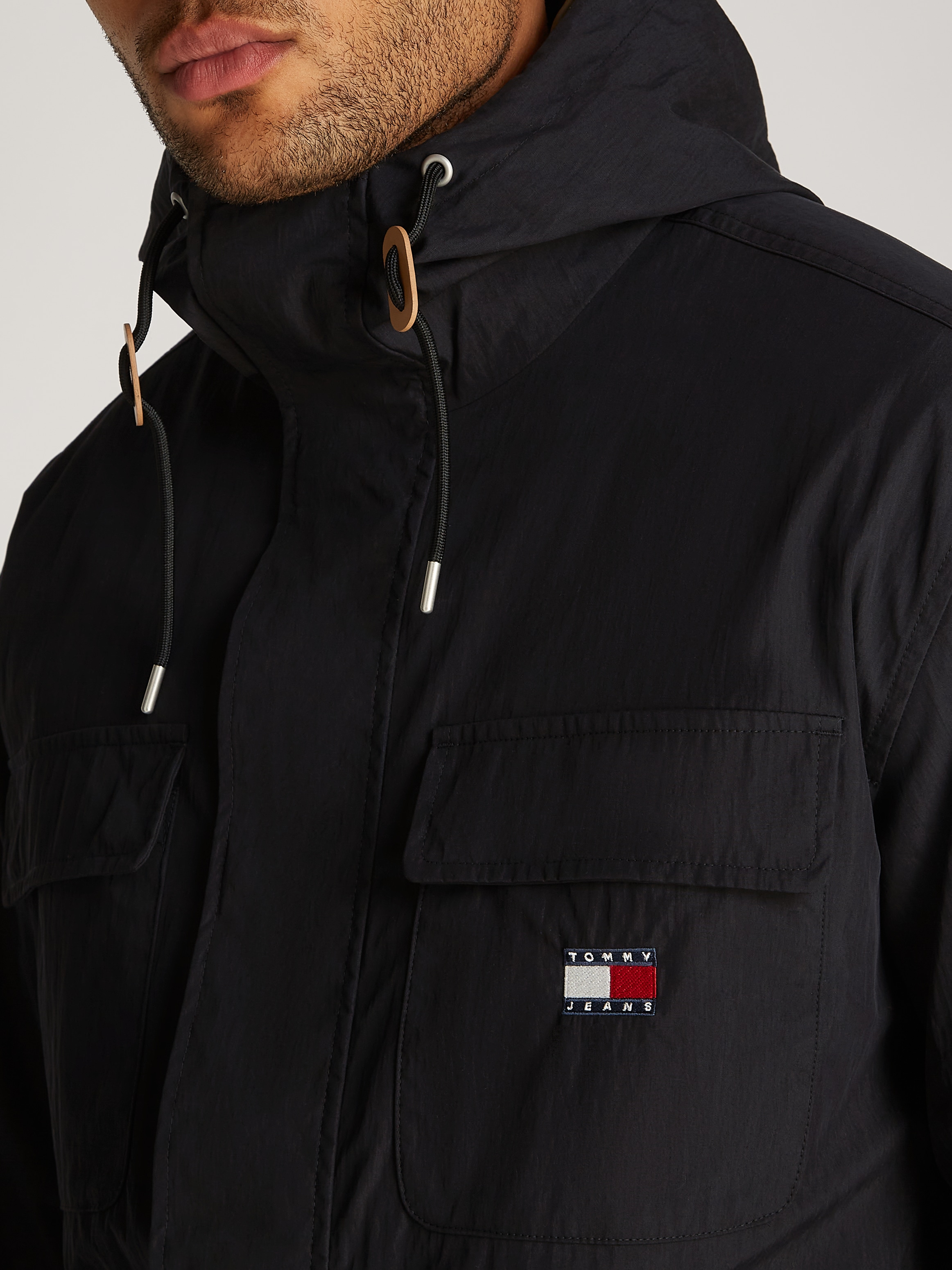 Tommy Jeans Parka »TJM UTILITY PARKA«, mit Kapuze, mit Logoprägung