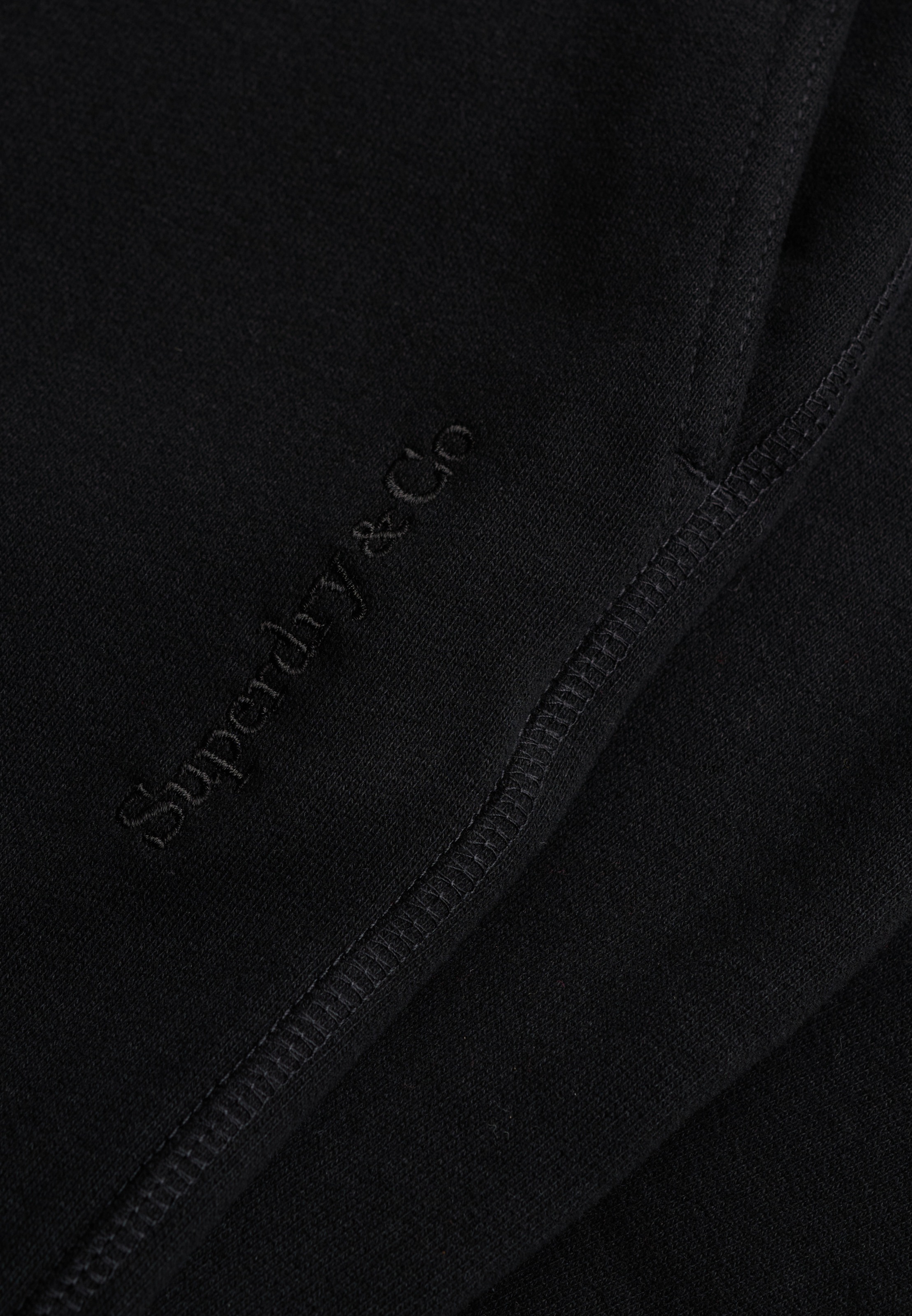 Superdry Pantalon sweat »ESSENTIAL COMPANY LOGO JOGGER«  mélange coton, coupe décontractée