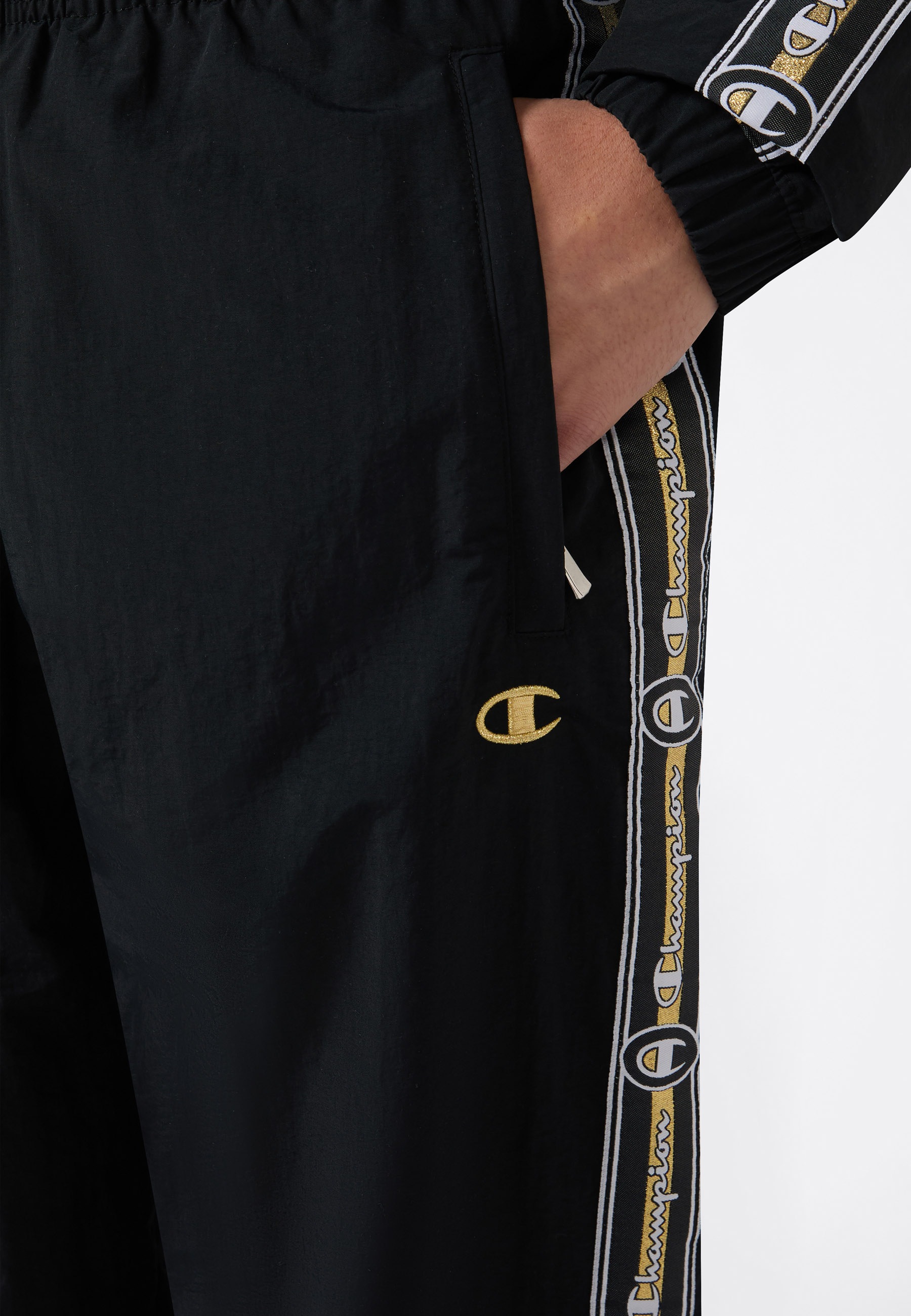 Champion Trainingshose »SPORTWEAR OPEN HEM PANTS Loose Fit Nylon«  mit sportlicher Optik, aus Polyamid