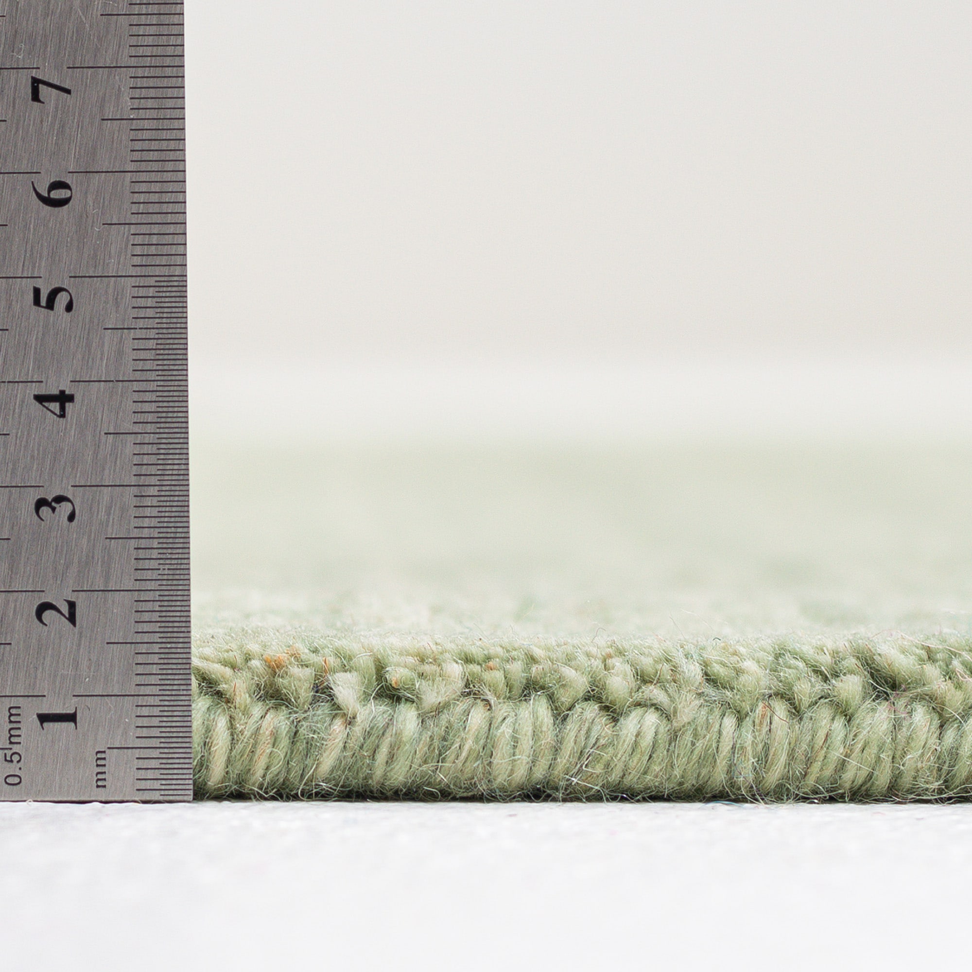 THEKO Tapis en laine »Holi« Rectangulaire 13 mm Höhe couleurs unies, légèrement chiné, pure laine, tissé main avec effet noué