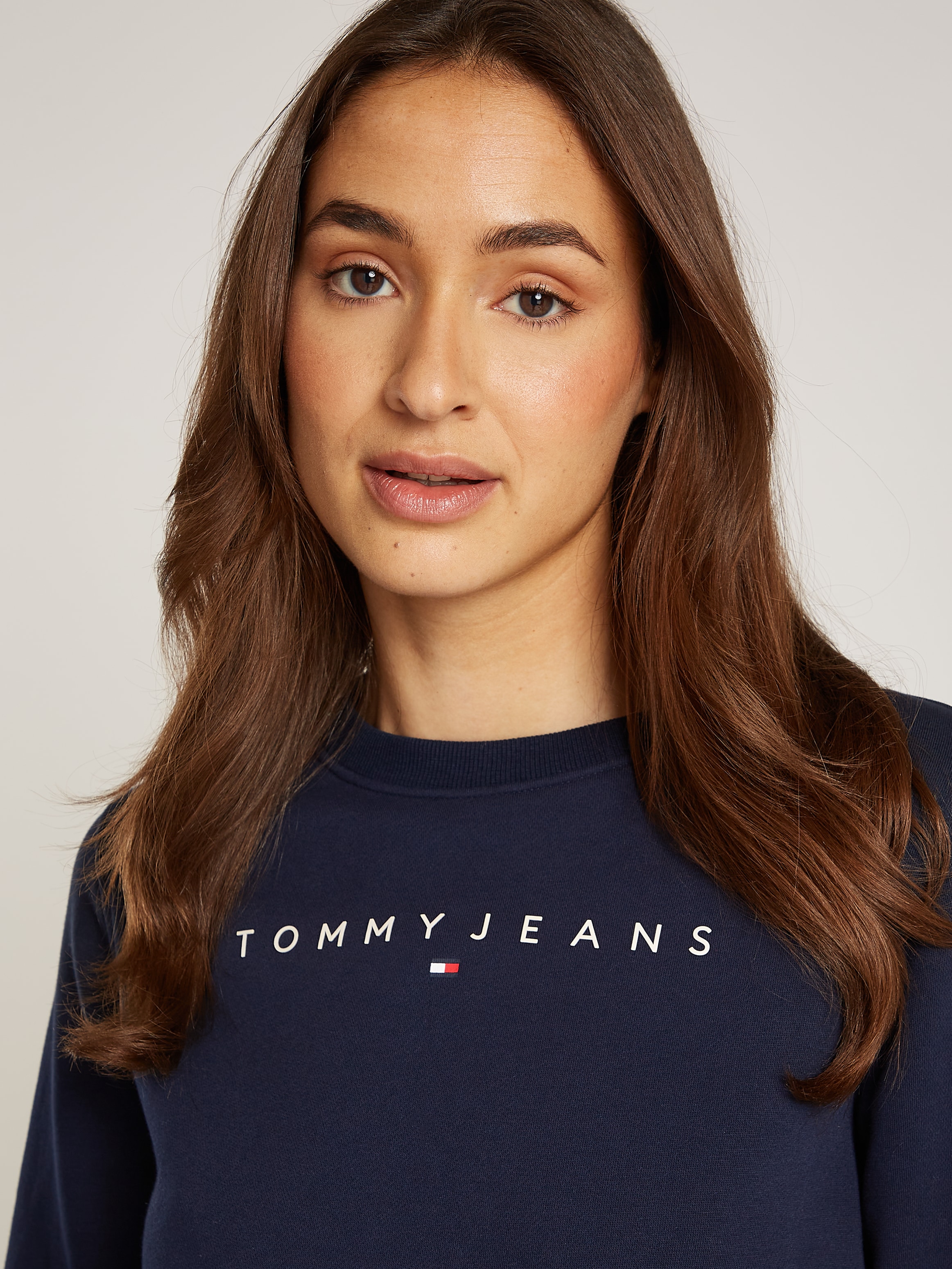 Tommy Jeans Sweatshirt »TJW REG LINEAR CREW EXT«, mit Logoschriftzug