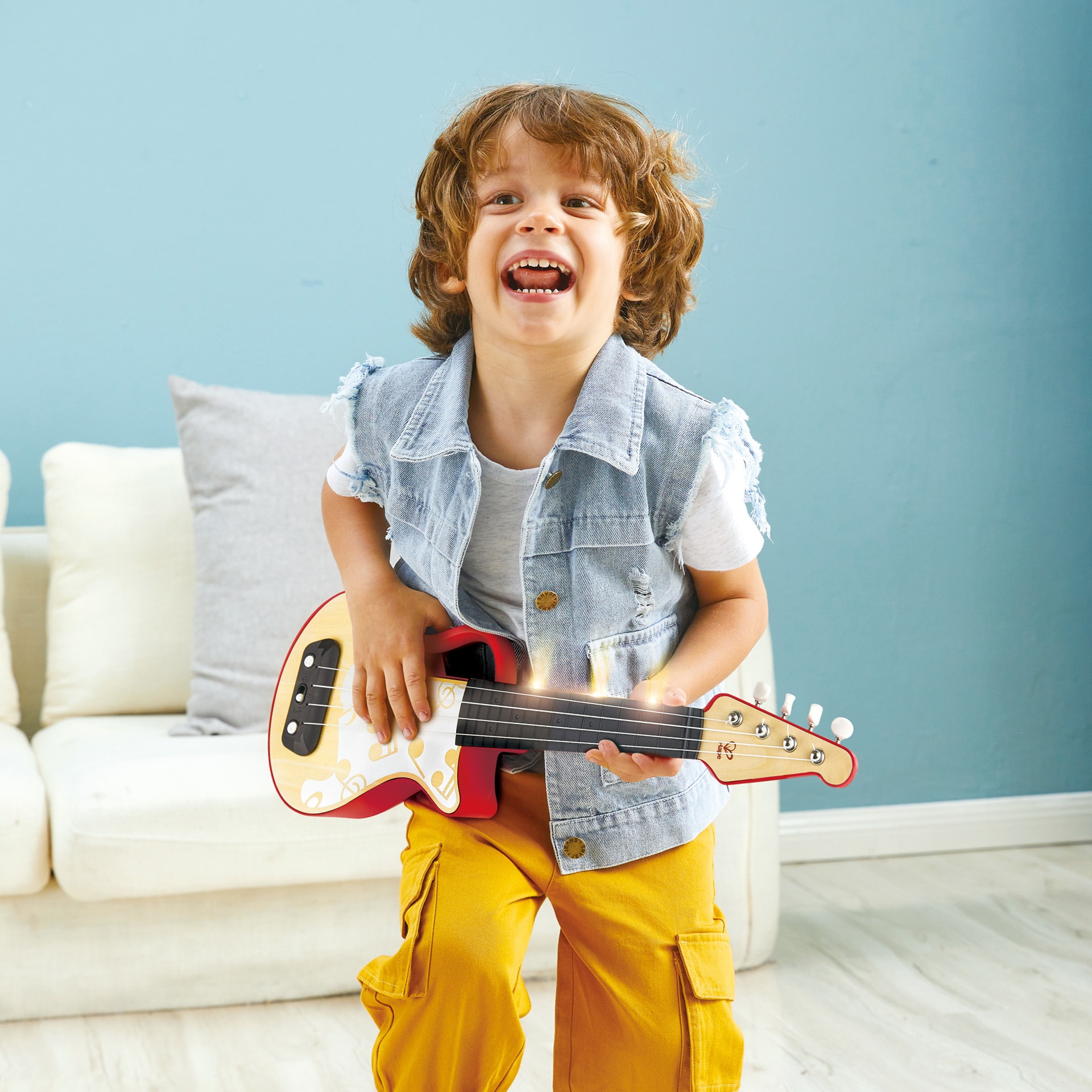 Hape Spielzeug-Musikinstrument »Elektrische Lern-Ukulele, rot«