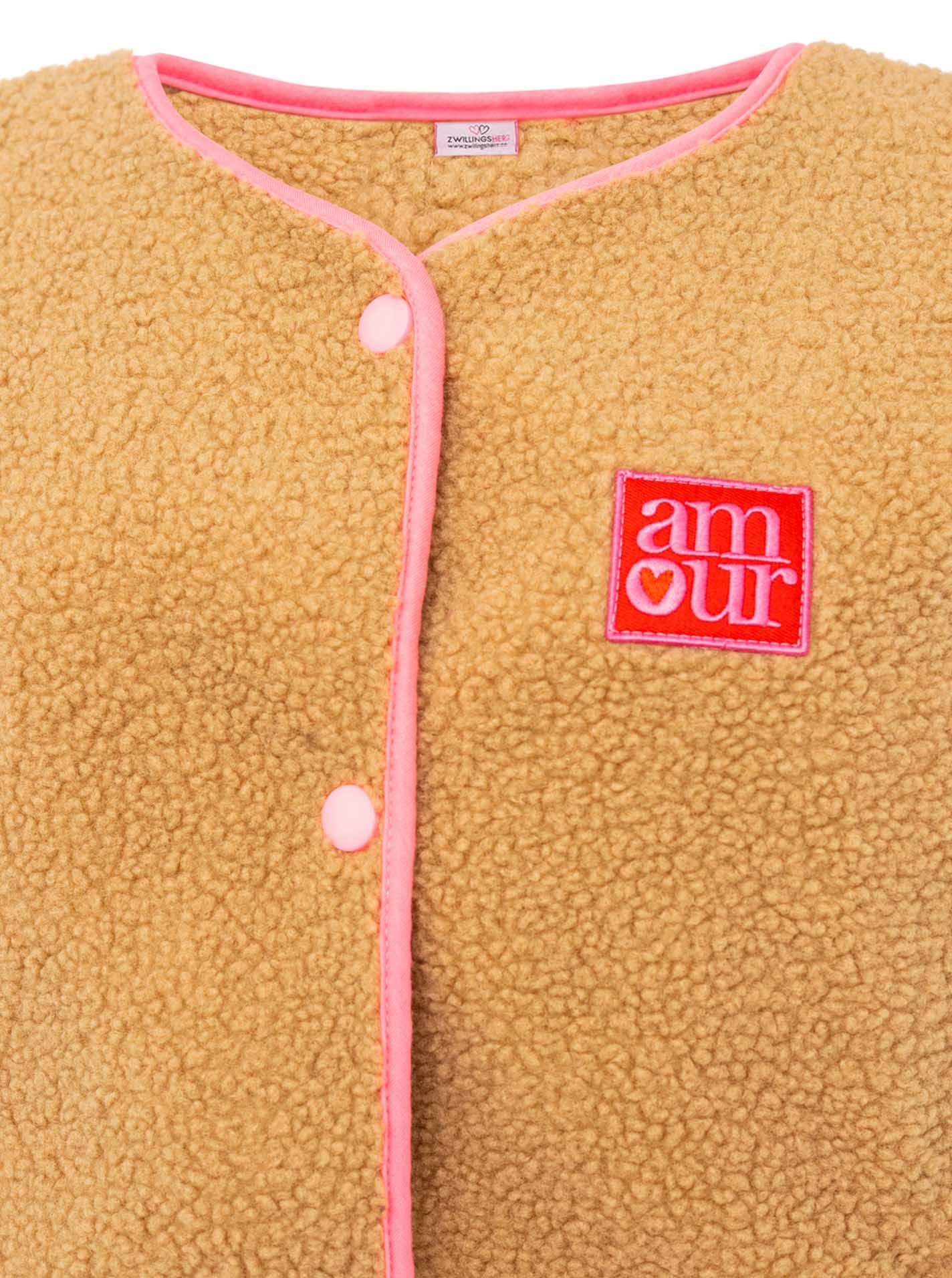Zwillingsherz Gilet en peluche »"Patch"« sans manches, bords bordés de rose, pressions, patch