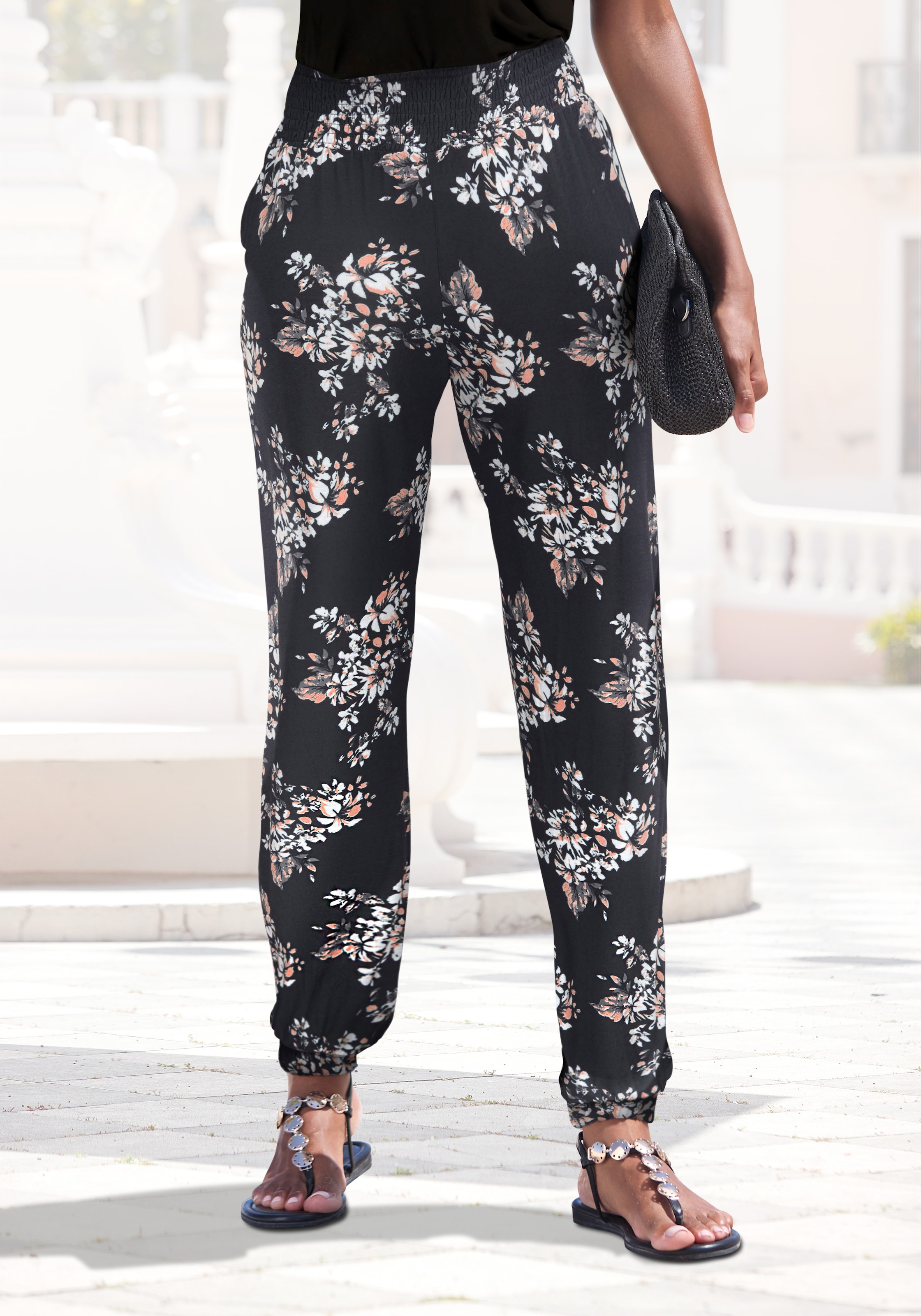 Image of LASCANA Strandhose "aus weicher, angenehmer Viskose und floralem Druck" mit dezentem Blumendruck, leichte Jerseyhose, Sommerhose, Schlupfhose