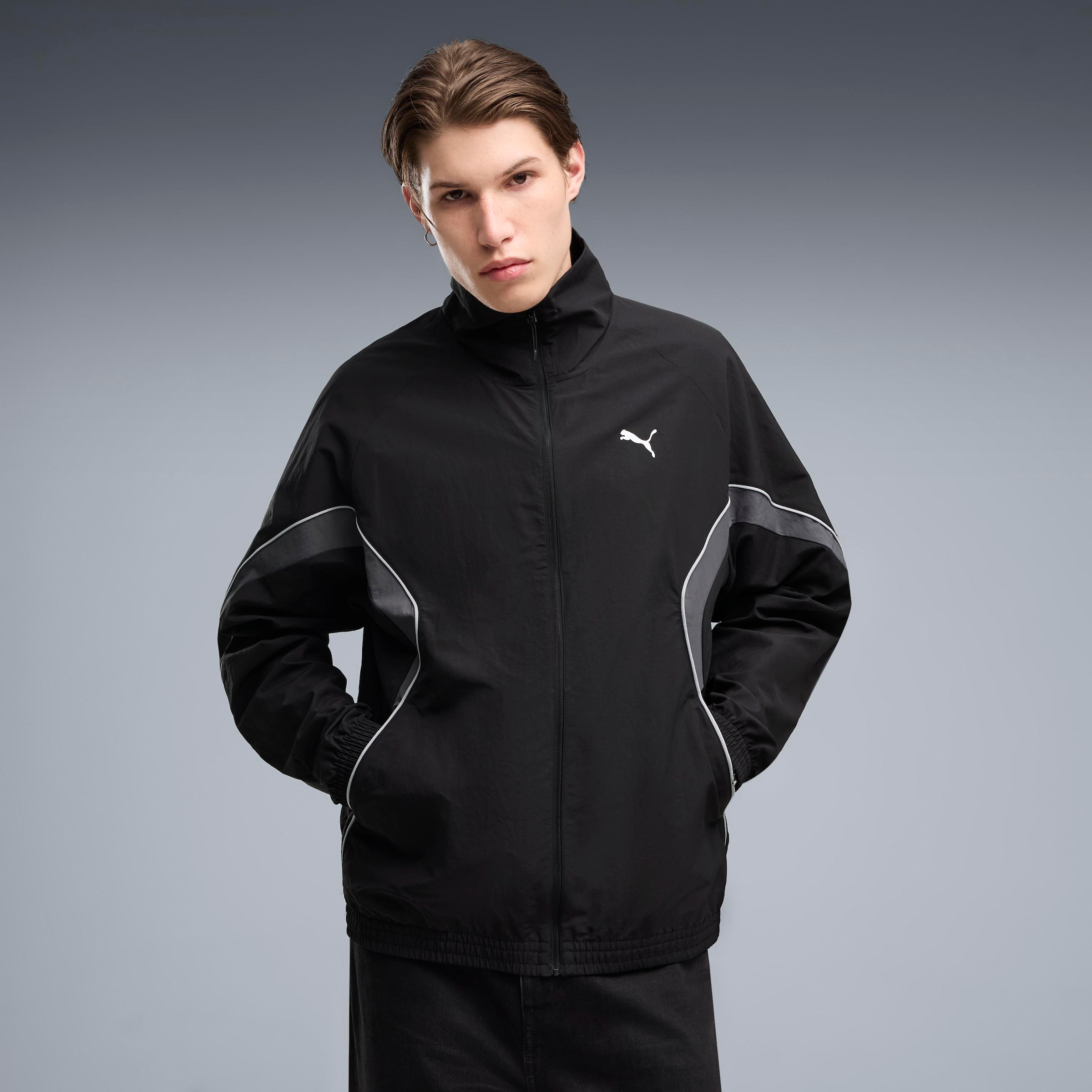 Image of PUMA Trainingsjacke "SPORT RELAXED WOVEN TRACK JACKET" ohne Kapuze mit Stehkragen, bedruckte Optik, Relaxed Fit, normale Länge