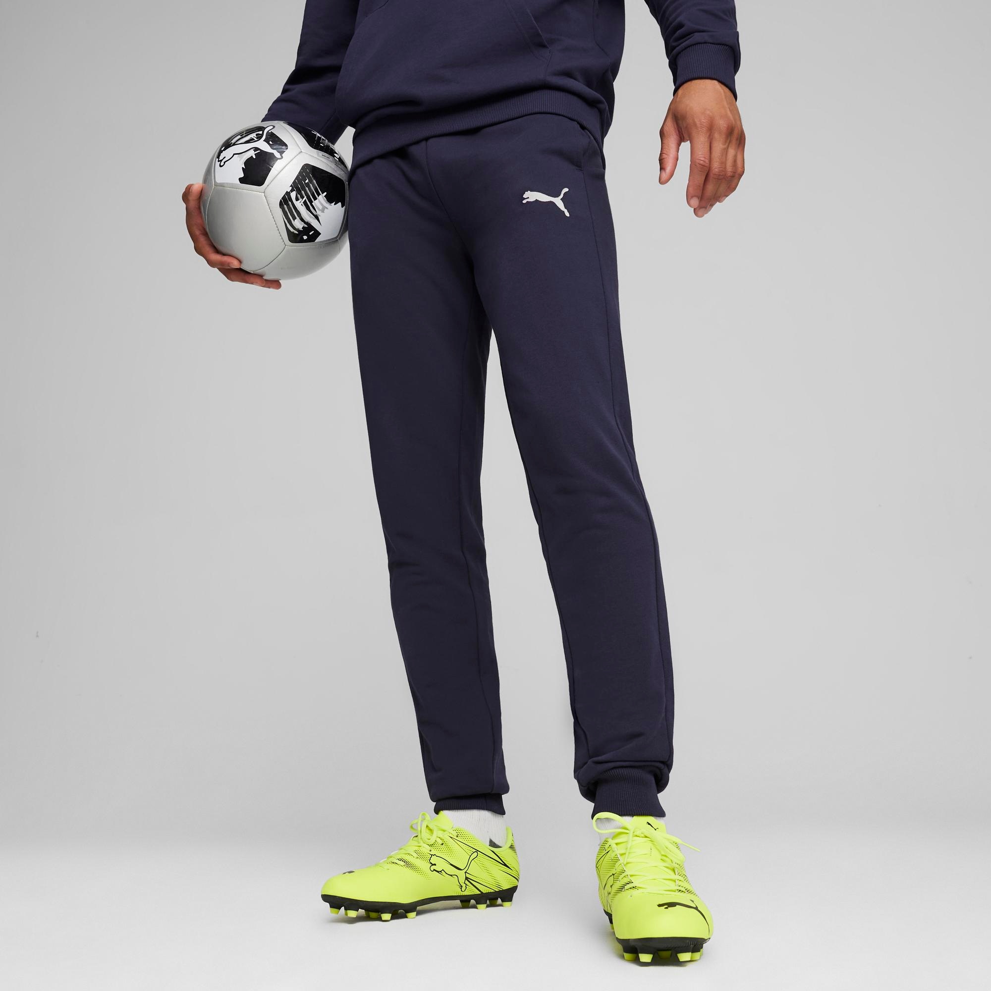 PUMA Pantalon de survêtement »TEAMGOAL CASUALS PANTS«  coupe slim fit, pour football et activités sportives